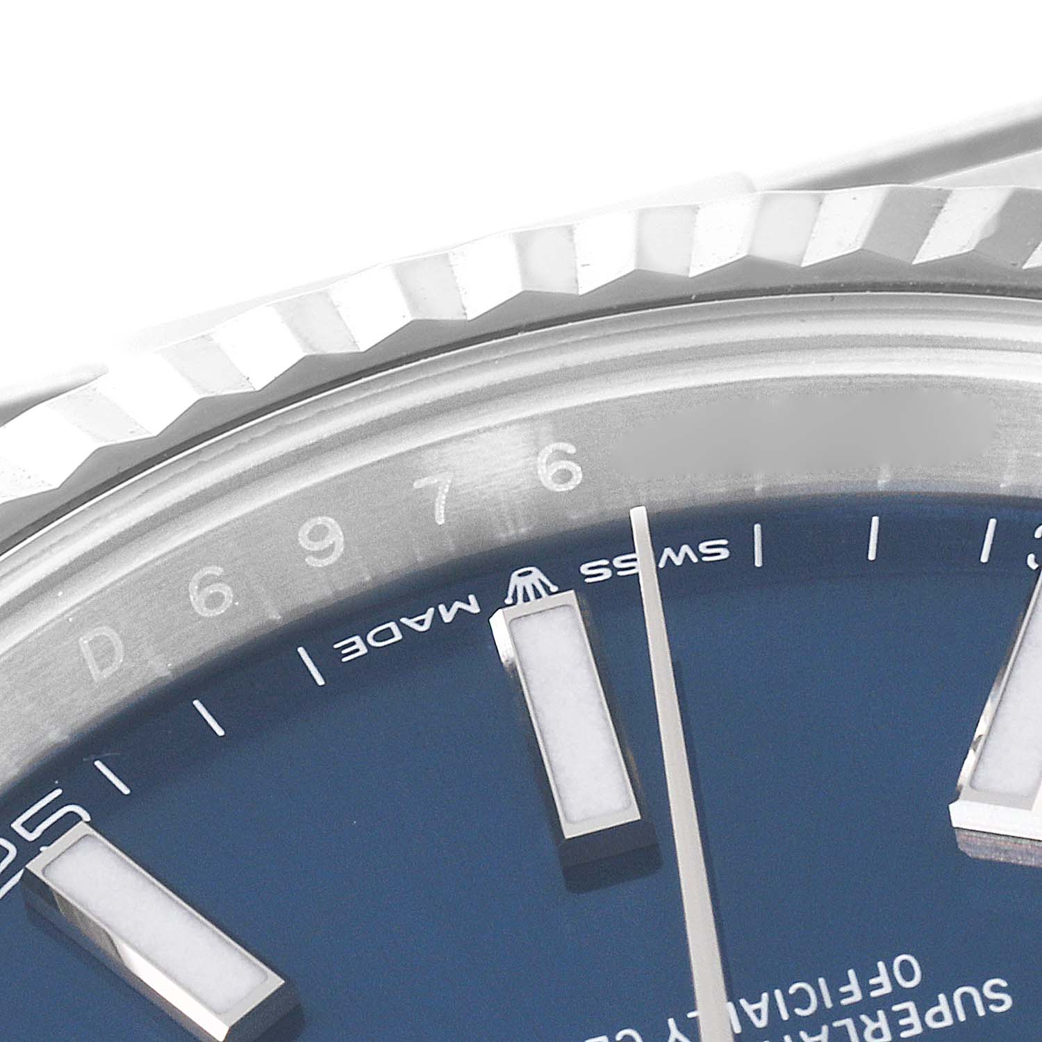 The image shows a close-up of the Rolex Datejust 41 126334 Men's Stainless Steel Blue Dial 126334 Men's Stainless Steel Blue Dial model, highlighting part of the bezel and dial.