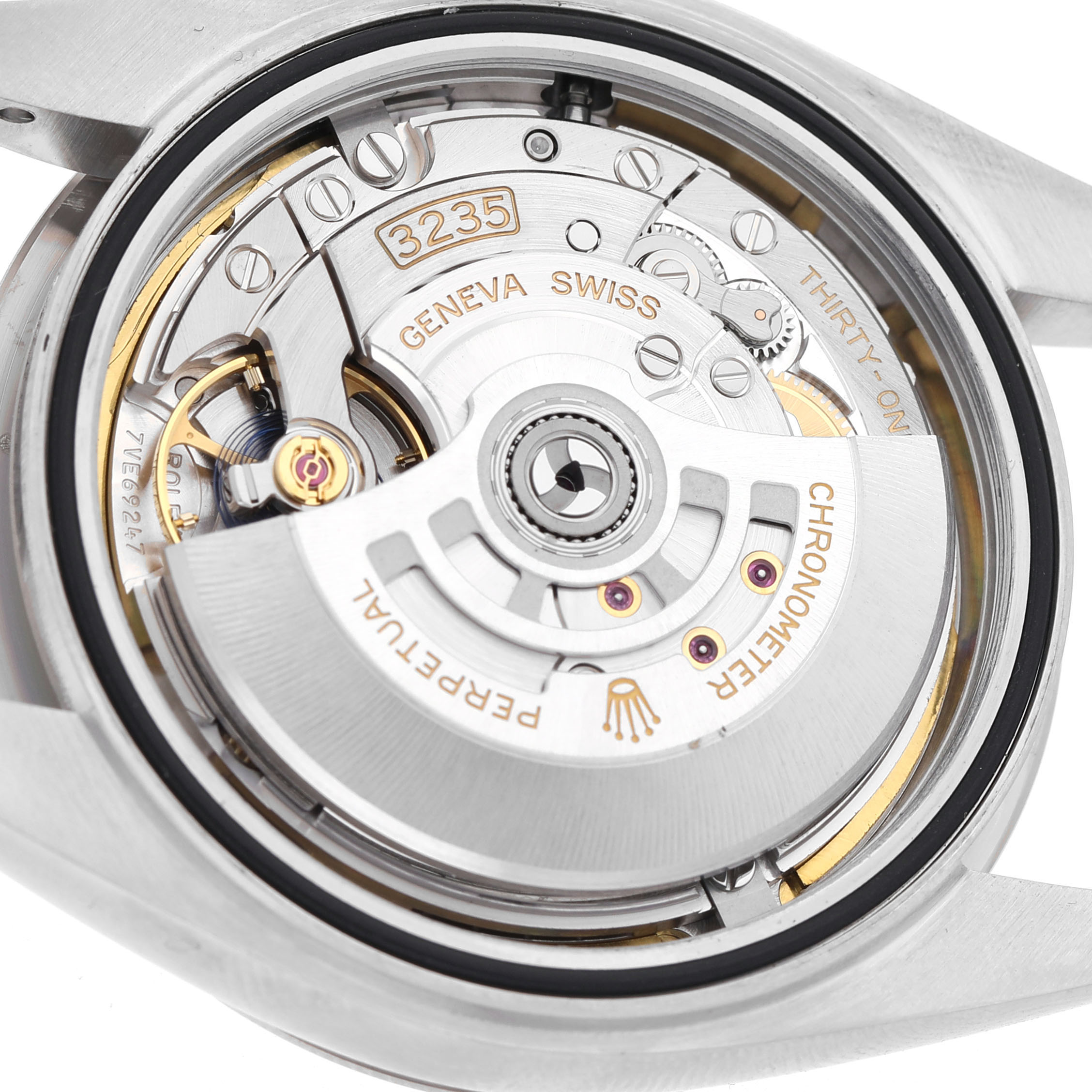 The image shows the movement of the Rolex Datejust 41 126334 Men's Stainless Steel Mother of Pearl Dial, highlighting its intricate inner mechanics.