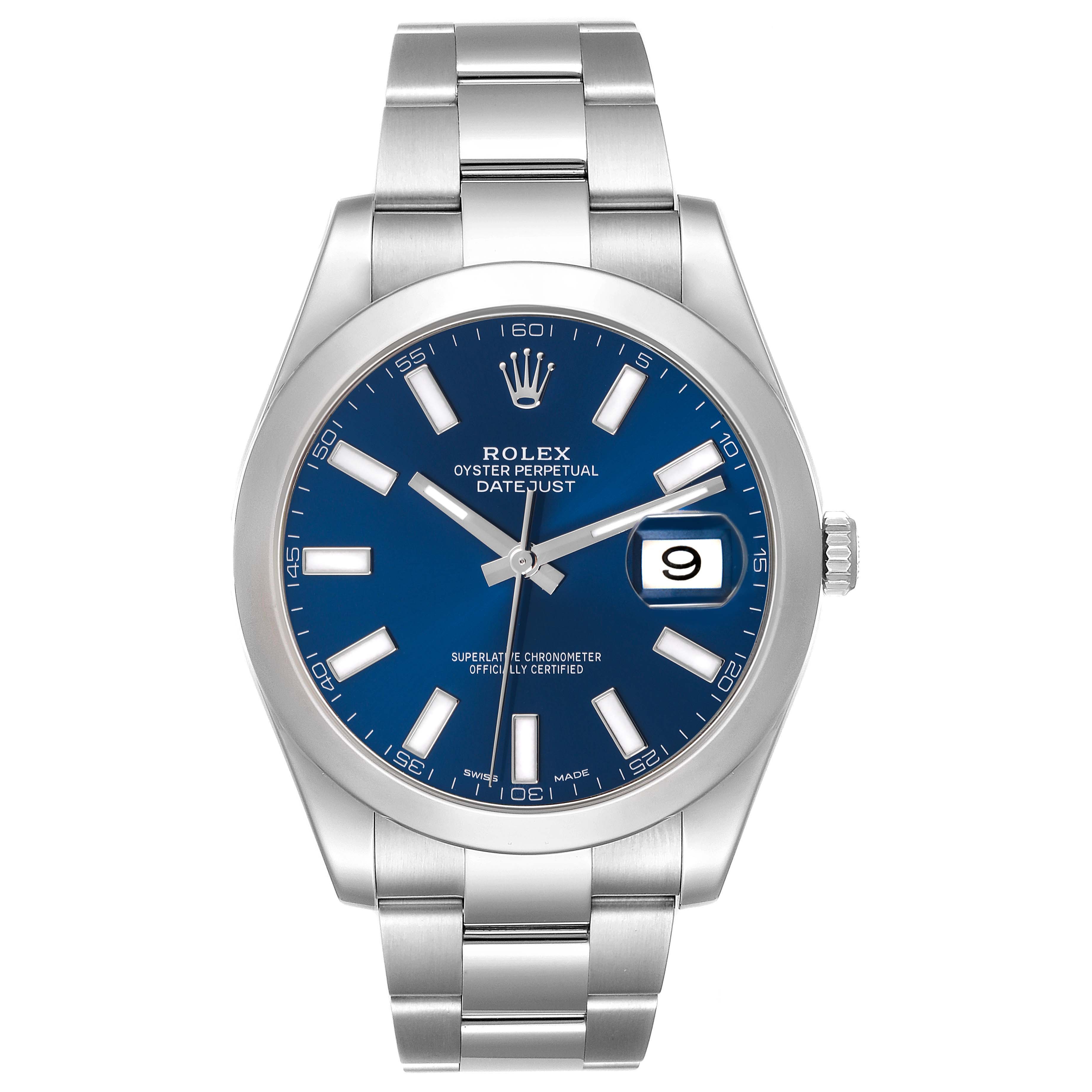 The Rolex Datejust 41 116300 Men
s Stainless Steel Blue Dial 116300 Men
s Stainless Steel Blue Dial watch is shown from a front angle, displaying its blue dial, hands, date window, and stainless steel bracelet.