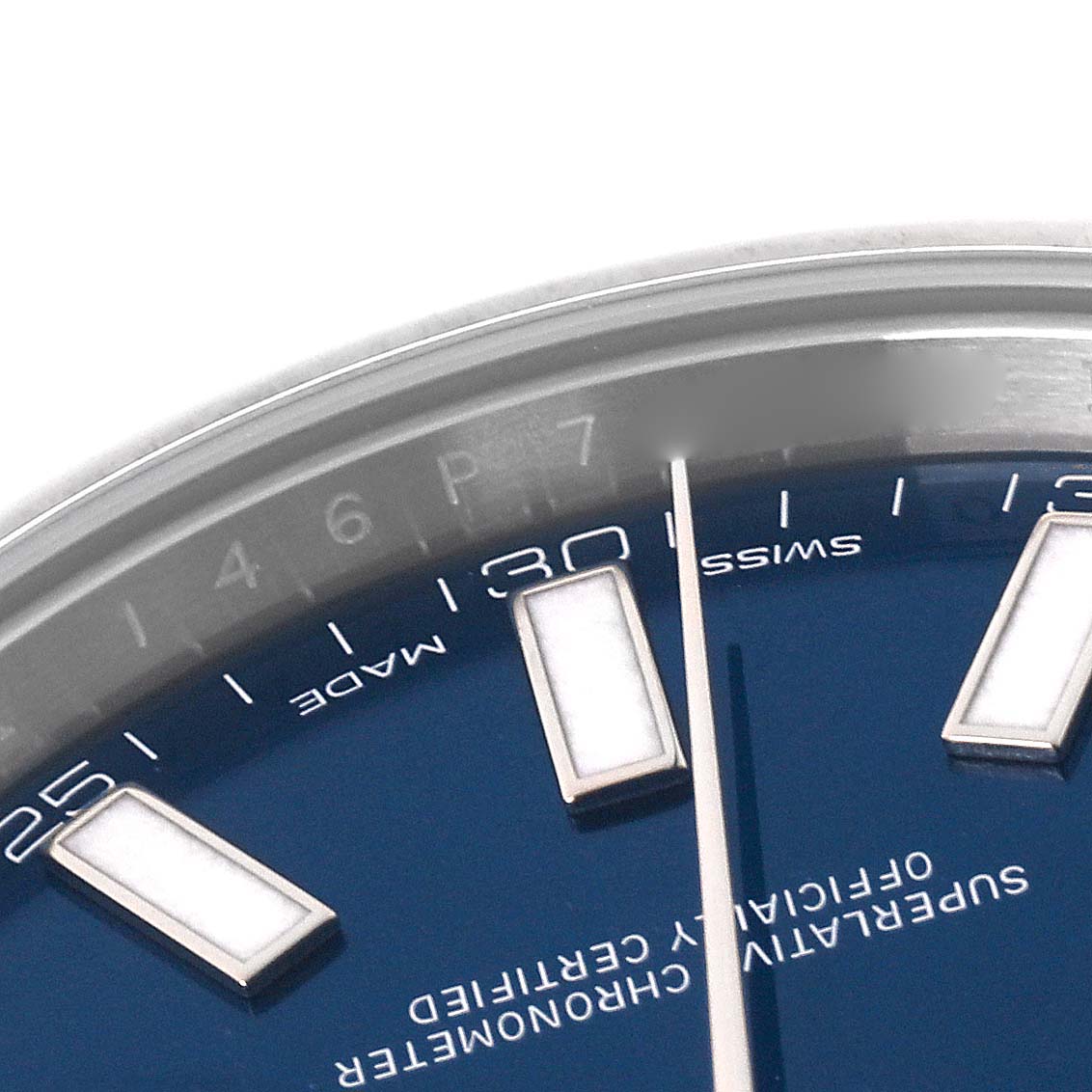 The image shows a close-up of the dial of a Rolex Datejust 41 116300 Men
s Stainless Steel Blue Dial 116300 Men
s Stainless Steel Blue Dial watch, featuring the markers and part of the date window.