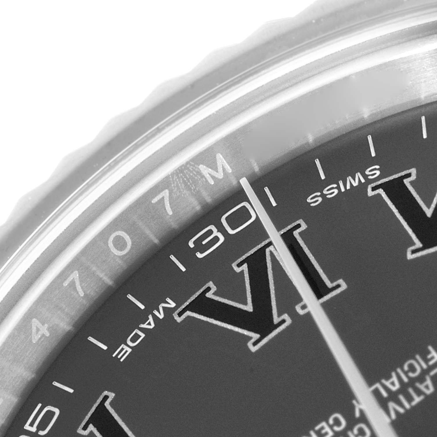 This close-up image of a Rolex Datejust 41 116334 Men's Stainless Steel Grey Dial 116334 Men's Stainless Steel Grey Dial watch shows the bezel and part of the dial with Roman numeral and minute markings.