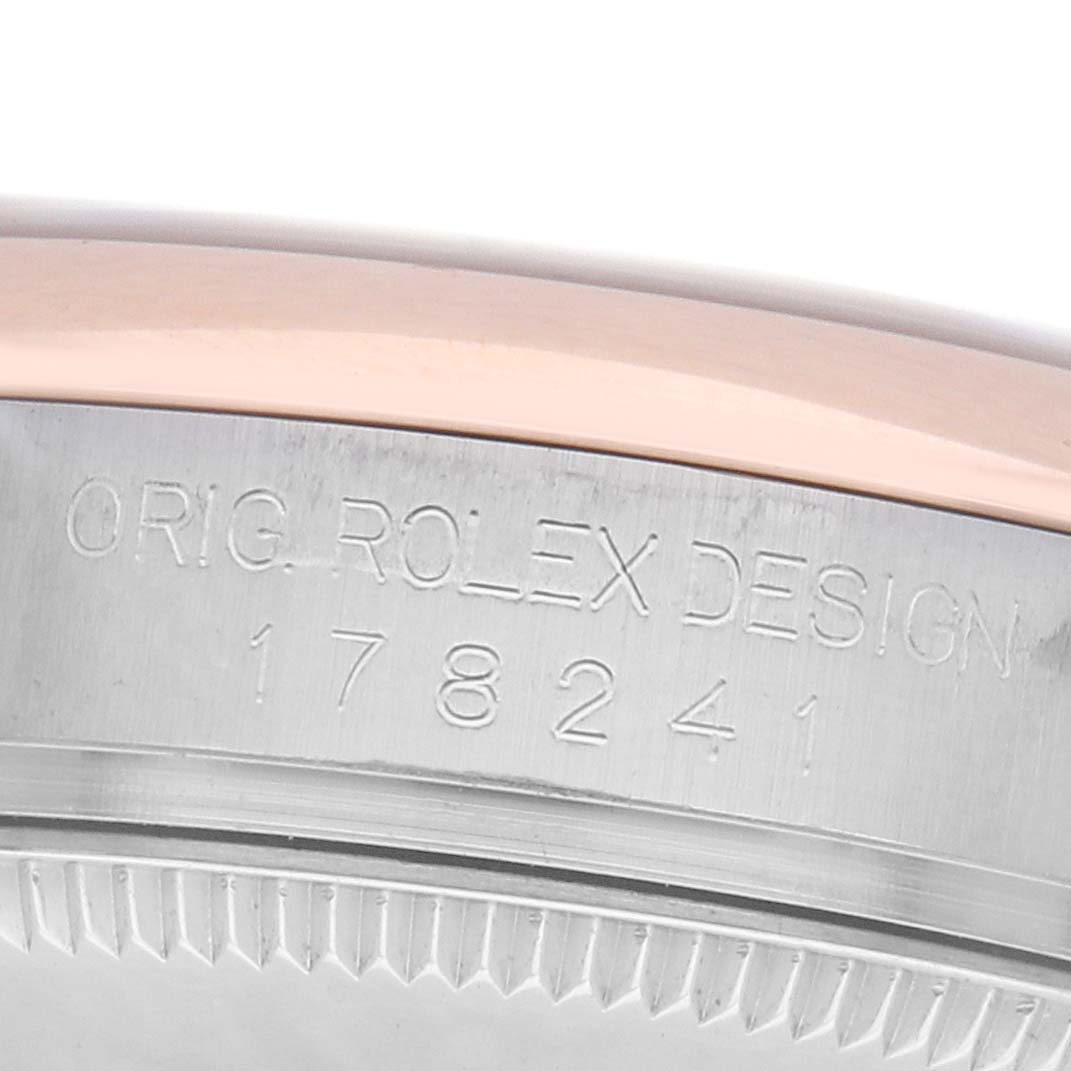 This image shows a close-up of the bezel and engraved side of a Mid-Size Rolex model 178241.