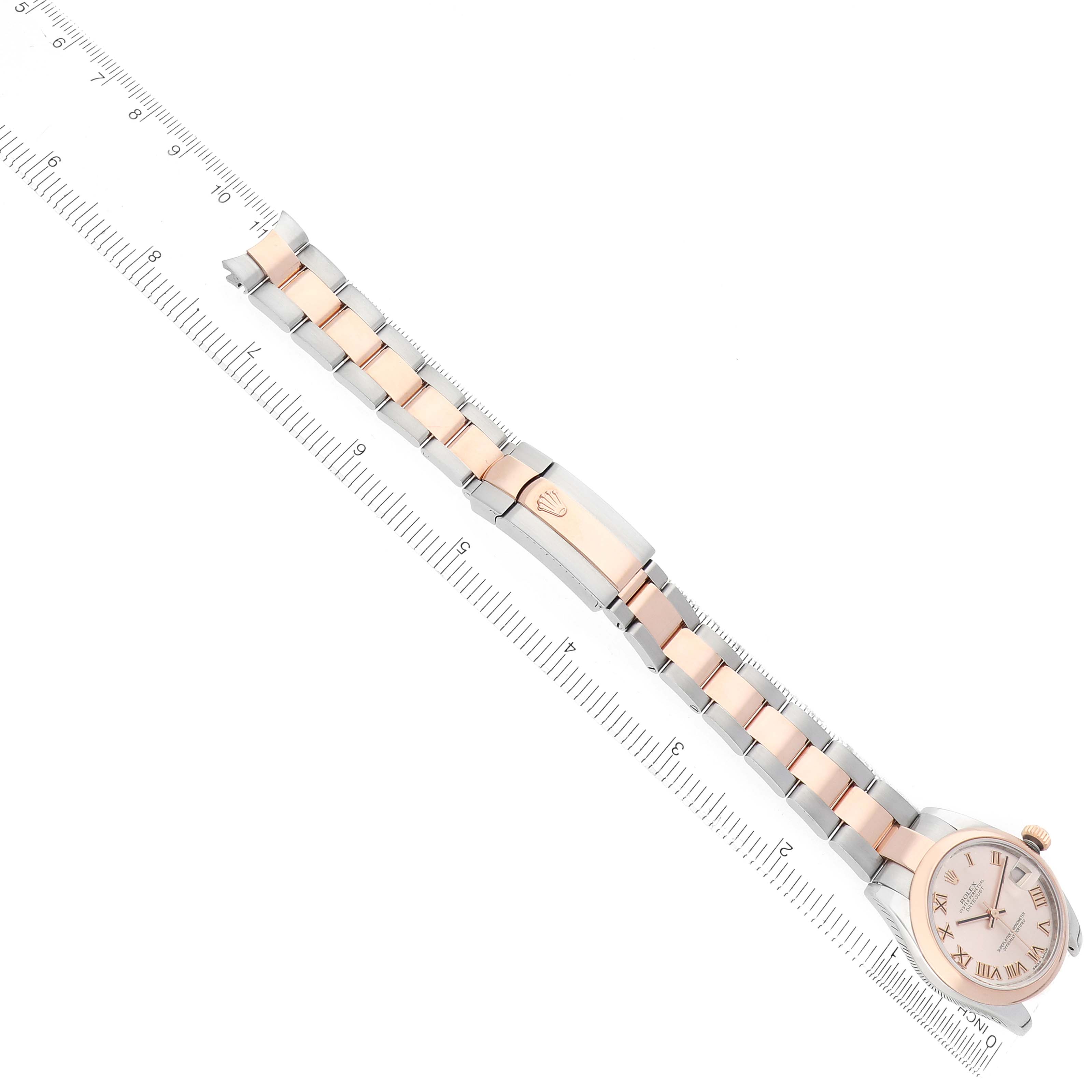 The Rolex Mid-Size 178241 Women
s Steel and Gold (two tone) Pink Dial watch is shown from a top-down angle, featuring the full bracelet and face.
