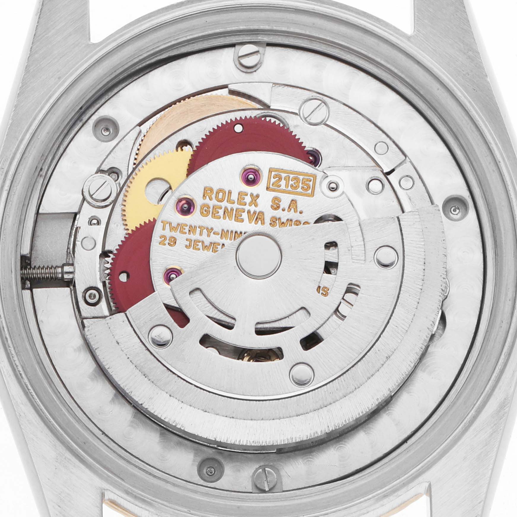 The image shows the inner mechanism of a Rolex Mid-Size 68273 Women's Steel and Gold (two tone) Champagne Dial watch, focusing on the movement and gears.