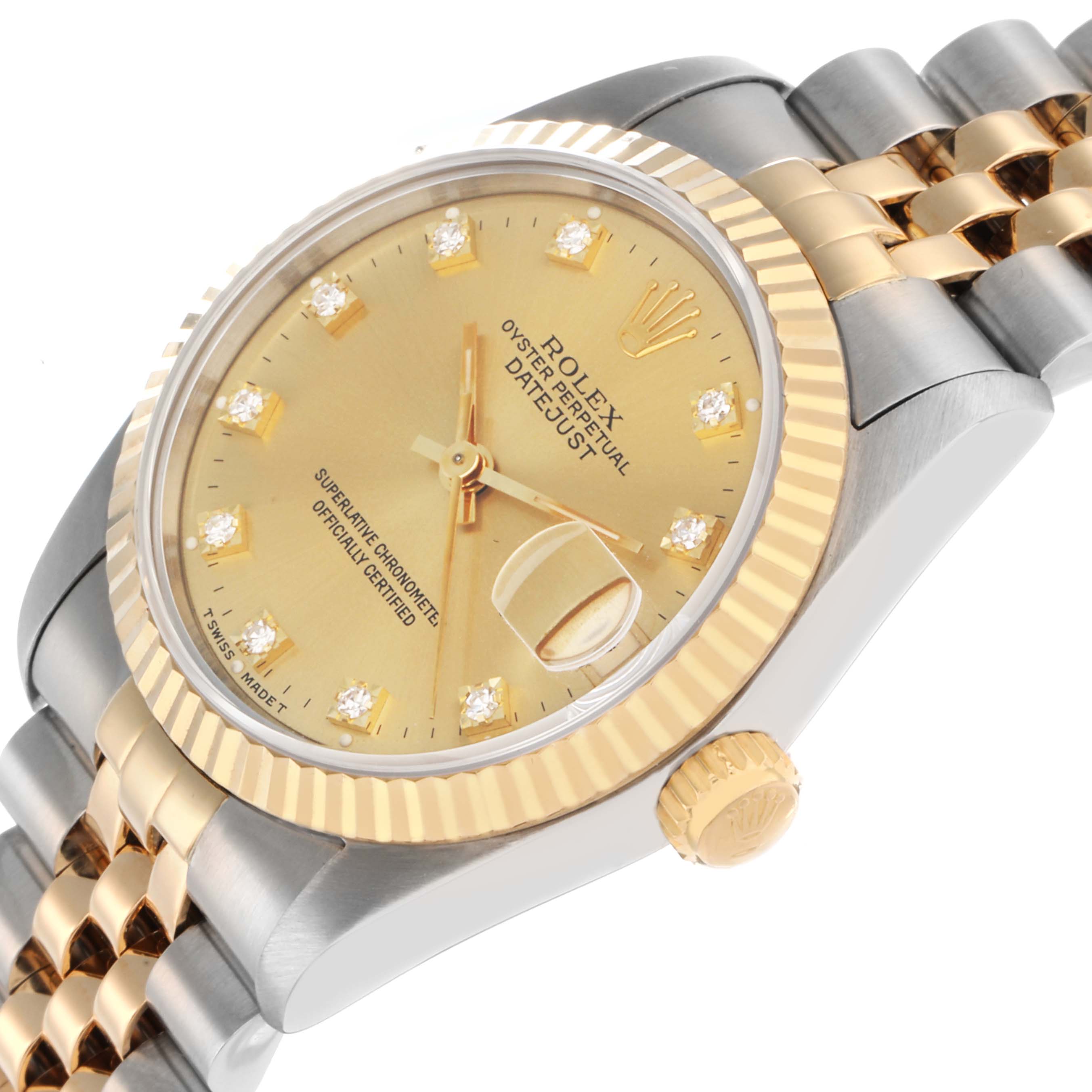 The Rolex Mid-Size 68273 Women's Steel and Gold (two tone) Champagne Dial watch is shown at a slight angle highlighting the gold dial, bezel, and part of the bracelet.