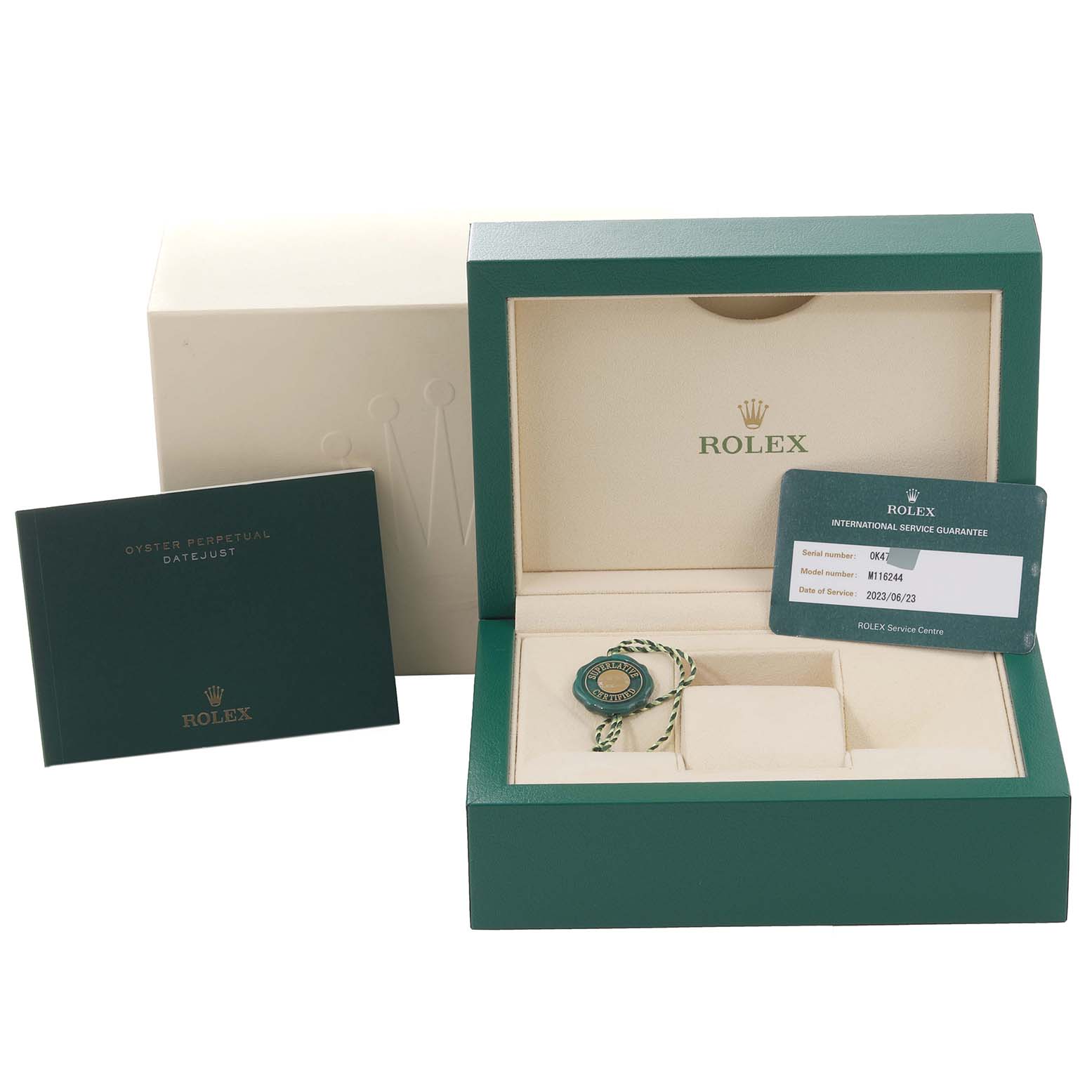This image shows the packaging, international service guarantee card, and booklet for a Rolex Datejust 116244 Men's Stainless Steel Mother of Pearl Dial 116244 Men's Stainless Steel Mother of Pearl Dial watch.