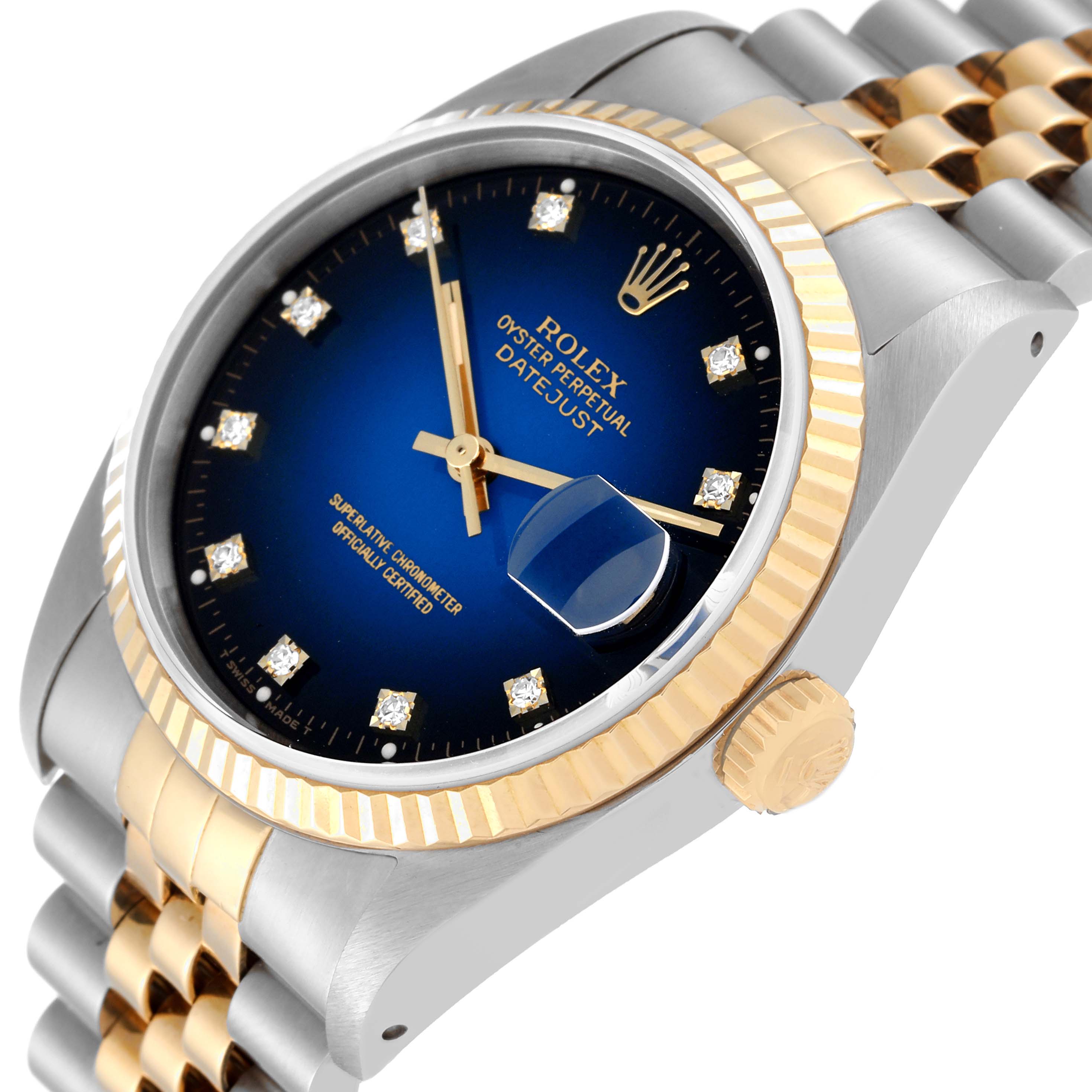 The image shows the Rolex Datejust 16233 Men's Stainless Steel Blue Dial 16233 Men's Stainless Steel Blue Dial watch at an angle, highlighting its blue dial, gold bezel, and two-tone bracelet.