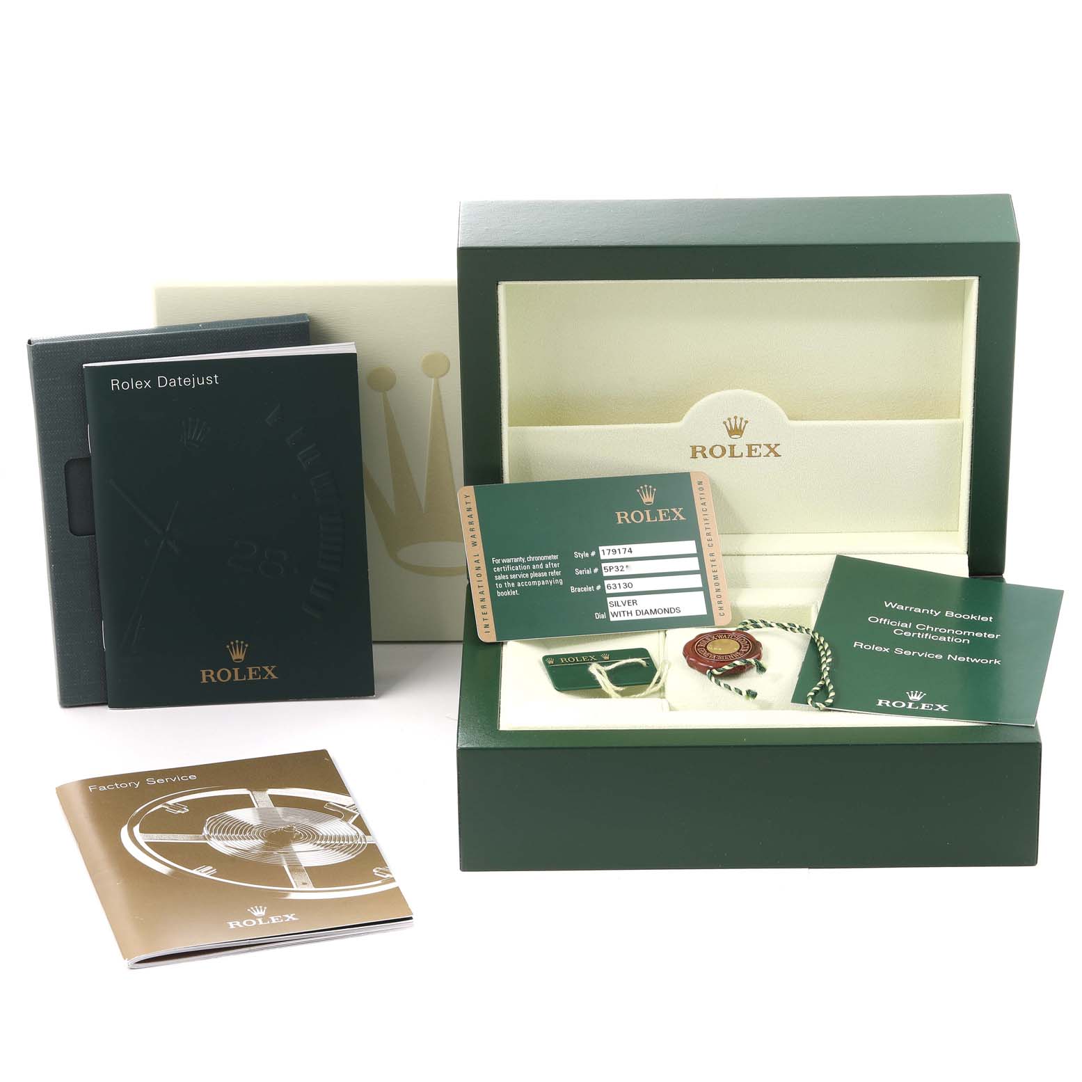 The image shows the accessories of a Rolex Datejust 179174 Women's Stainless Steel Silver Dial 179174 Women's Stainless Steel Silver Dial watch, including the box, warranty card, and booklets.