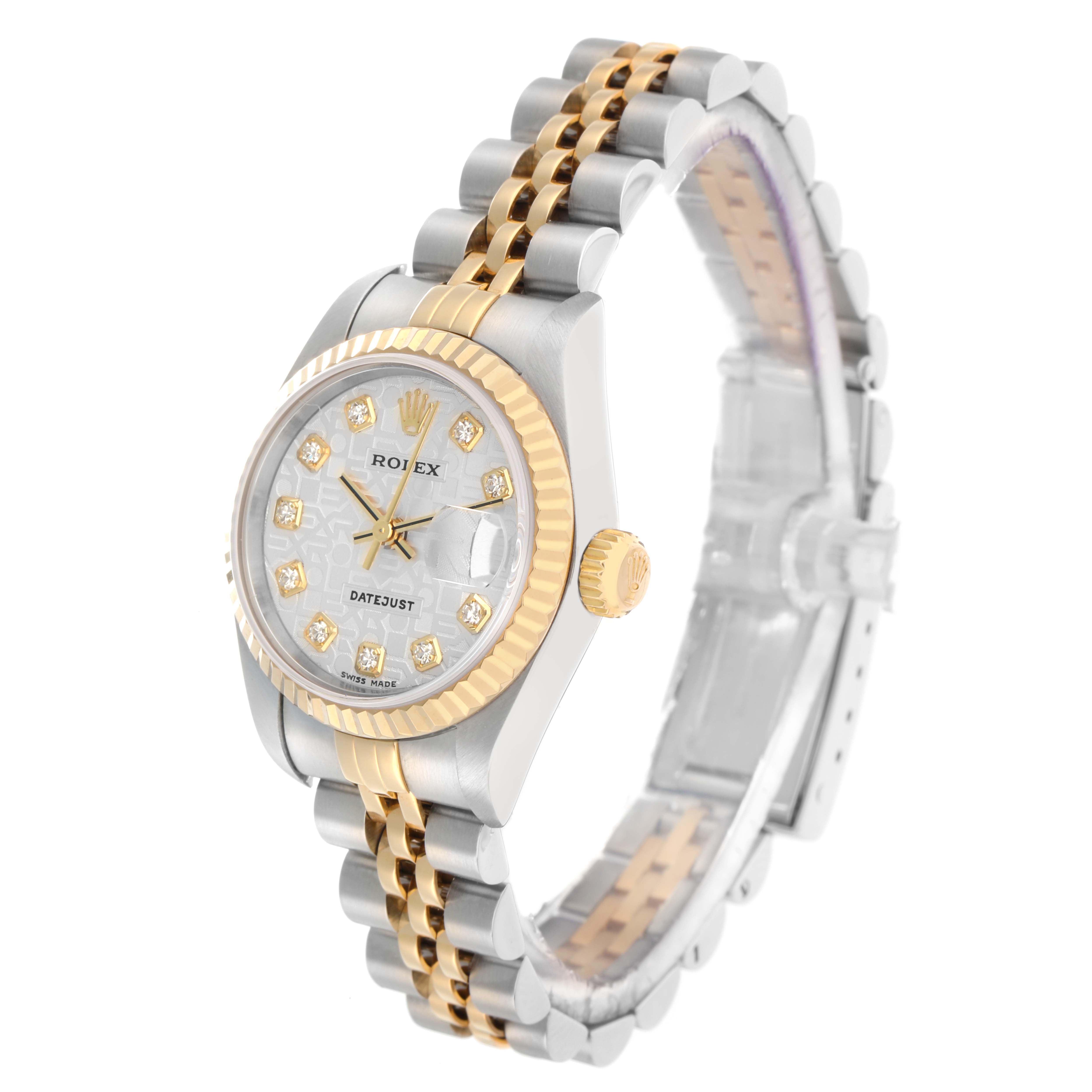 The Rolex Datejust 79173 Women
s Steel and Gold (two tone) Champagne Dial watch is shown at a three-quarter angle, highlighting its bezel, dial, and two-tone bracelet.