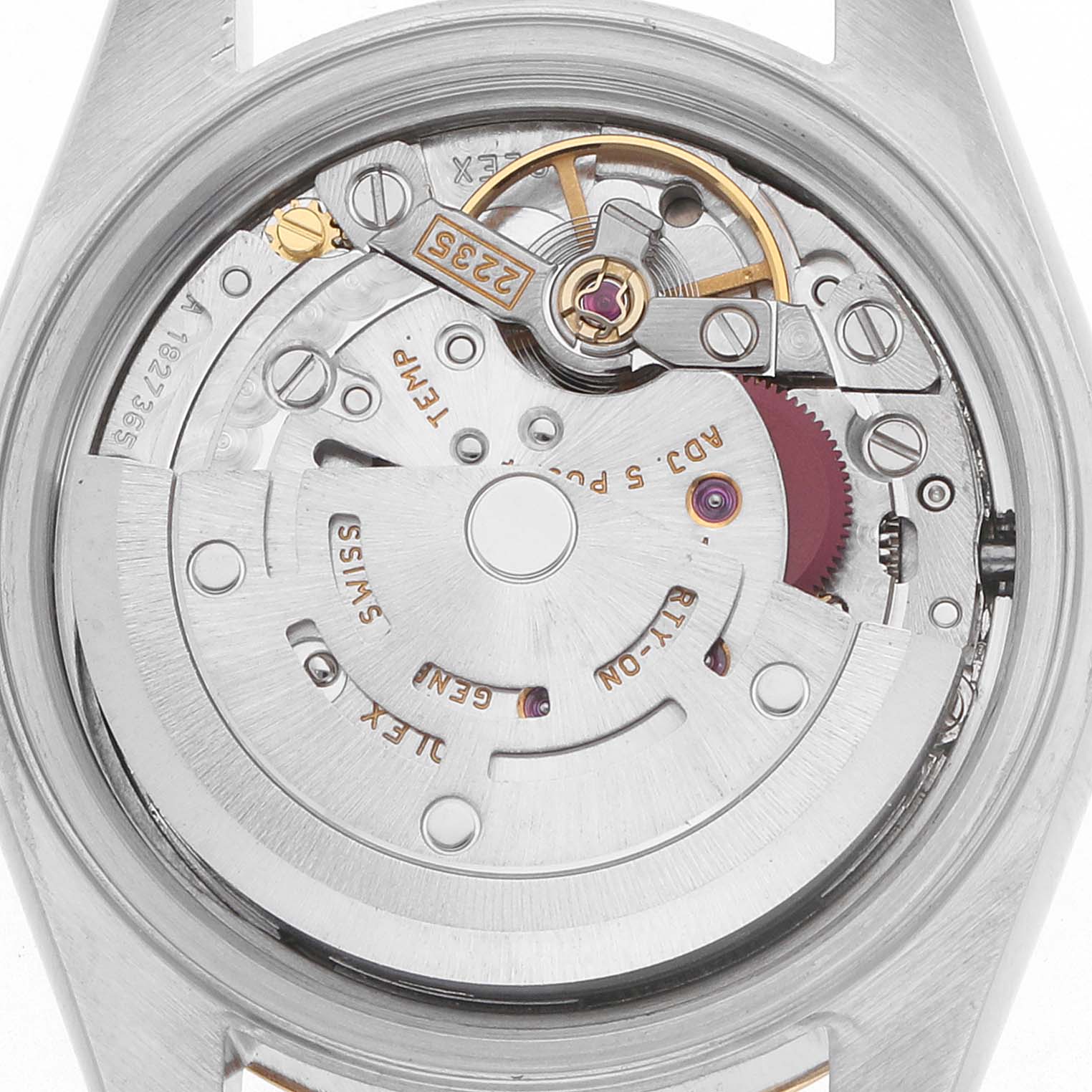 This image shows the movement of a Rolex Datejust 79173 Women
s Steel and Gold (two tone) Champagne Dial watch from a rear angle, highlighting the rotor and intricate mechanics.