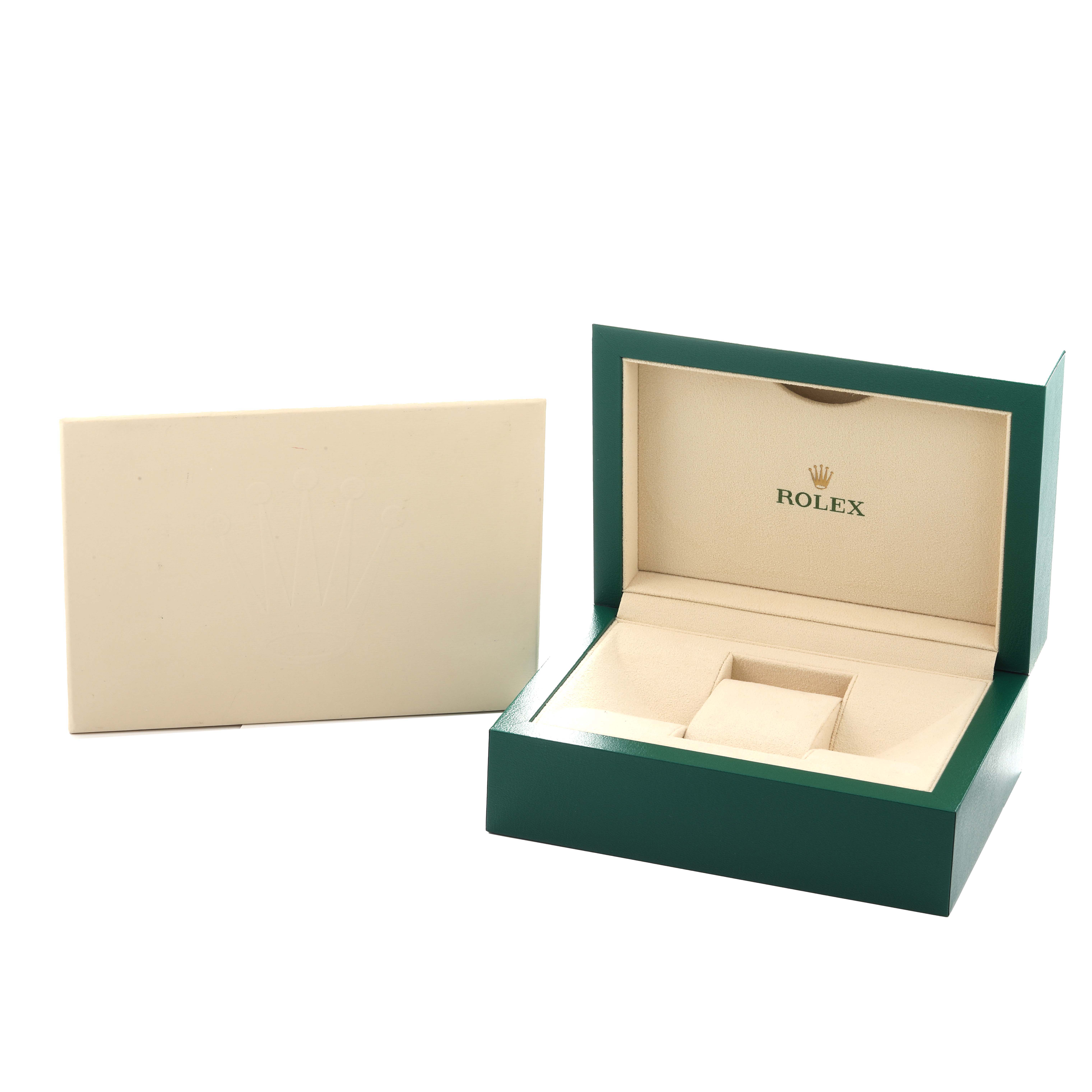 The image shows an open green and beige Rolex Datejust 116243 Men
s Steel and Gold (two tone) Black Dial watch box with the logo, alongside its outer packaging.