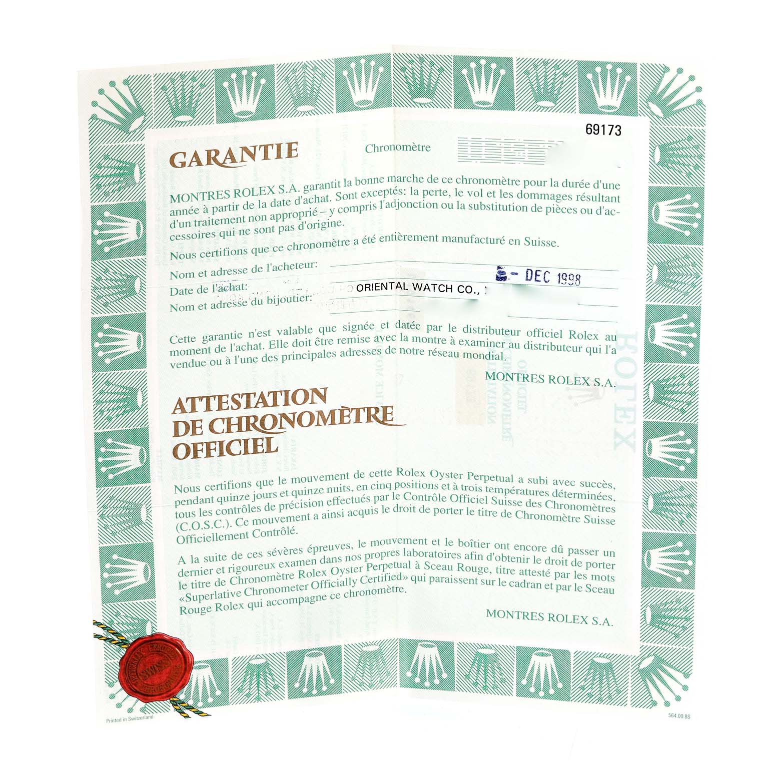 This image shows the official warranty and chronometer certificate for a Rolex Datejust 69173 Women's Stainless Steel Champagne Dial 69173 Women's Stainless Steel Champagne Dial watch from a top-down angle.