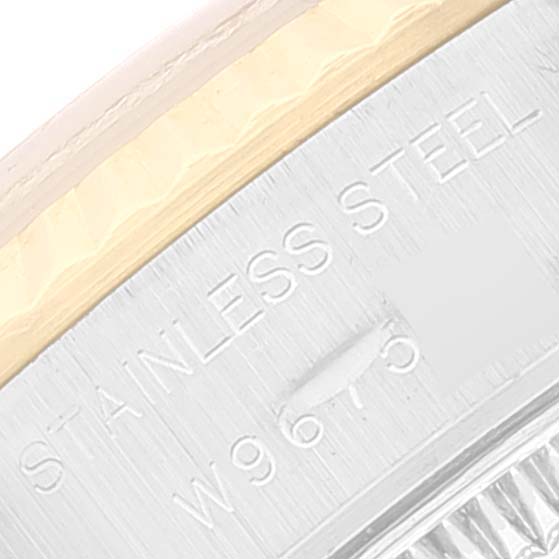 This is a close-up of the case back edge and materials description on a Datejust model by Rolex.