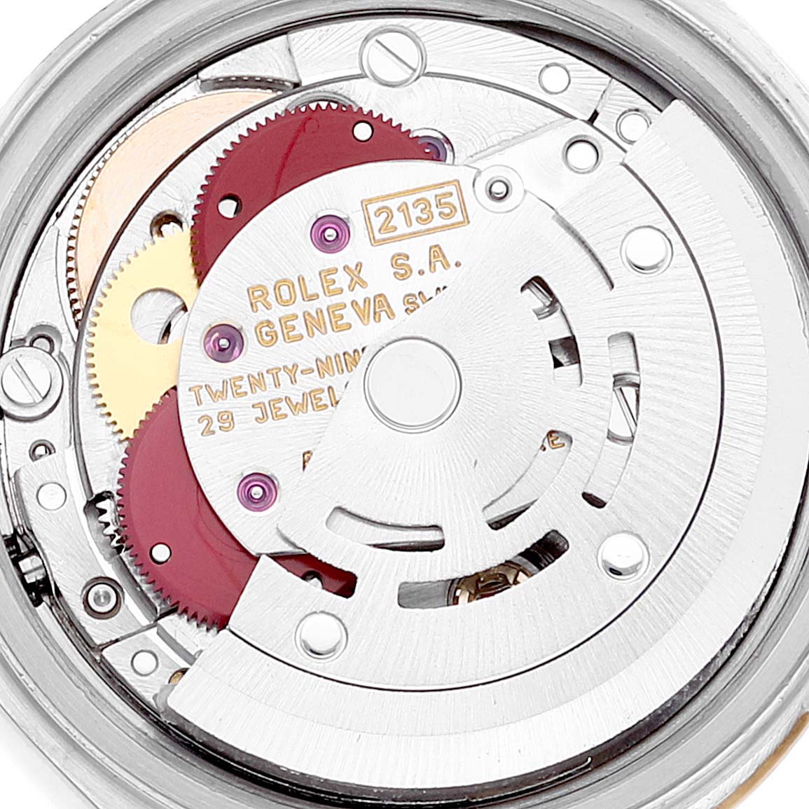 The image shows a close-up view of the movement of the Rolex Datejust 69173 Women's Steel and Gold (two tone) Champagne Dial 69173 Women's Steel and Gold (two tone) Champagne Dial watch, focusing on internal components and gears.