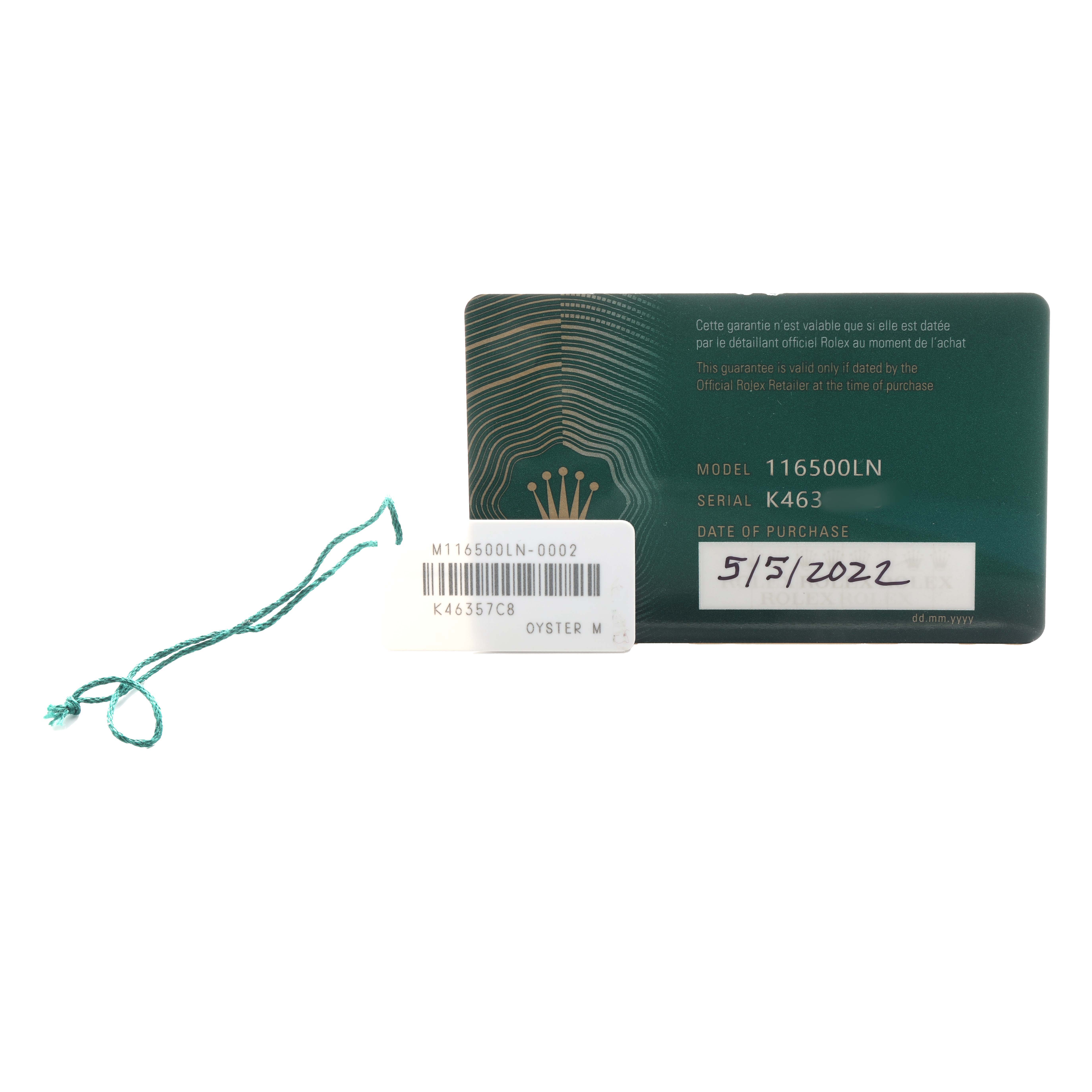 The image shows a warranty card for a Rolex Daytona 116500 Men
s Stainless Steel Black Dial model, featuring model and serial numbers with a string tag attached.