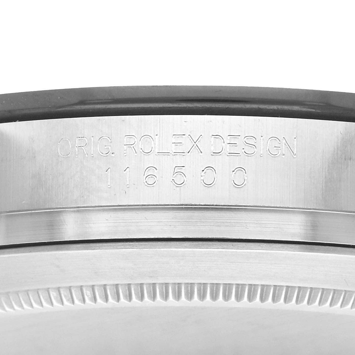 The image shows a close-up of the side of a Rolex Daytona 116500 Men
s Stainless Steel Black Dial watch case, focusing on the engraved model number.