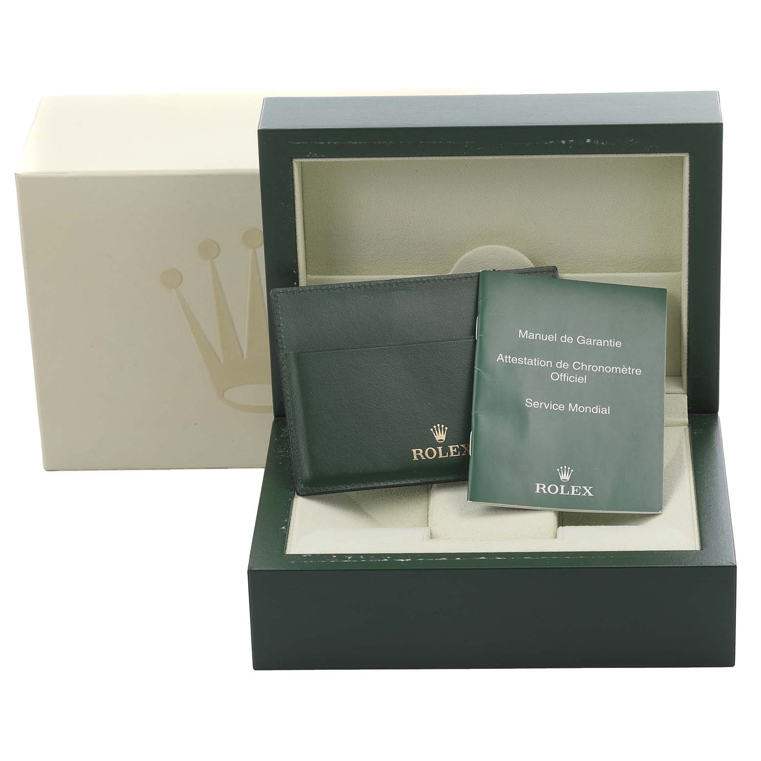 The image shows the packaging and warranty booklet for the Rolex Explorer 16570 Men
s Stainless Steel Black Dial 16570 Men
s Stainless Steel Black Dial watch.