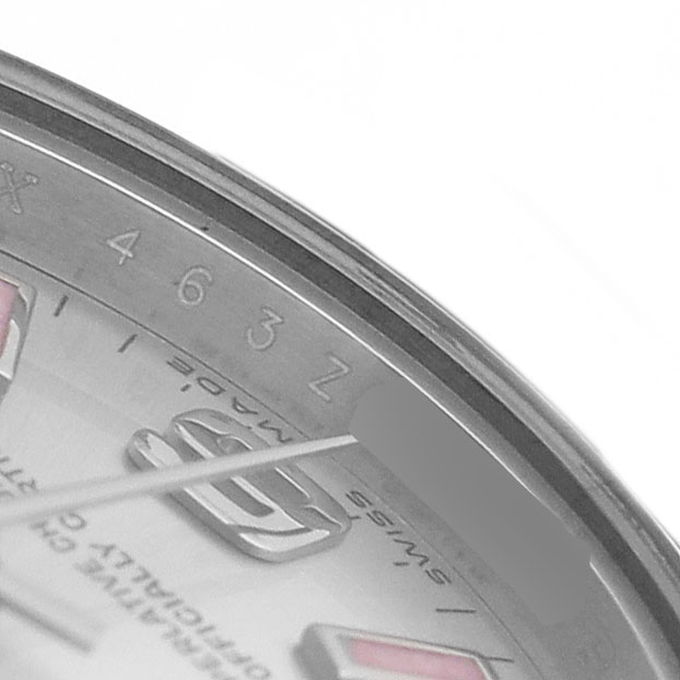 The image shows a close-up of the Rolex Oyster Perpetual 176200 Women's Stainless Steel Silver Dial's watch face, including part of the bezel and dial details.
