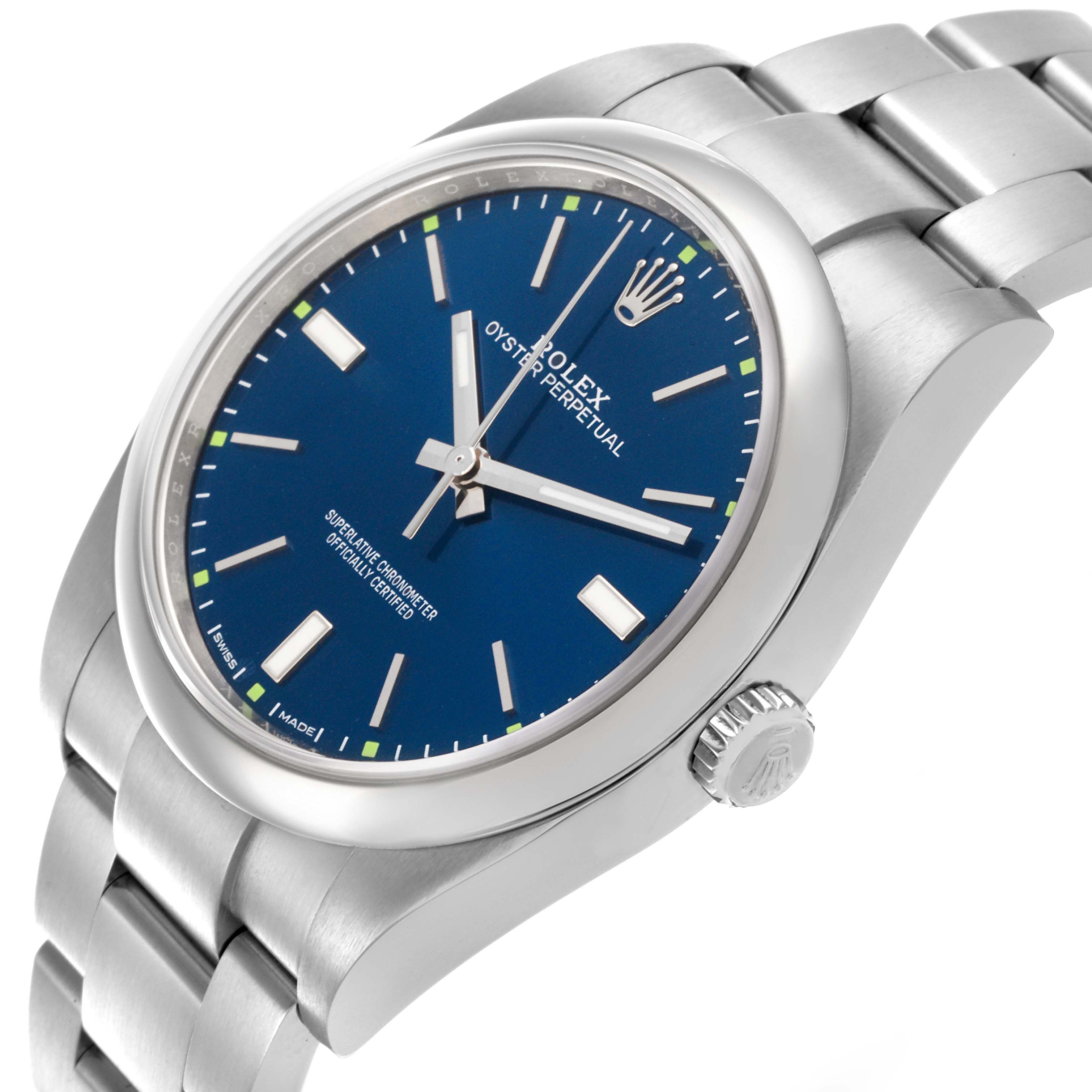 The Rolex Oyster Perpetual 114300 Men's Stainless Steel Blue Dial 114300 Men's Stainless Steel Blue Dial watch is shown at a three-quarter angle, highlighting the blue dial, bezel, bracelet, and crown.