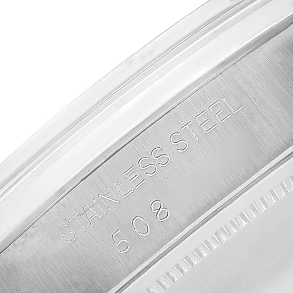 This image shows a close-up of the engraved stainless steel case back of a Rolex Vintage Collection 6694 Men
s Stainless Steel Silver Dial 6694 Men
s Stainless Steel Silver Dial watch.