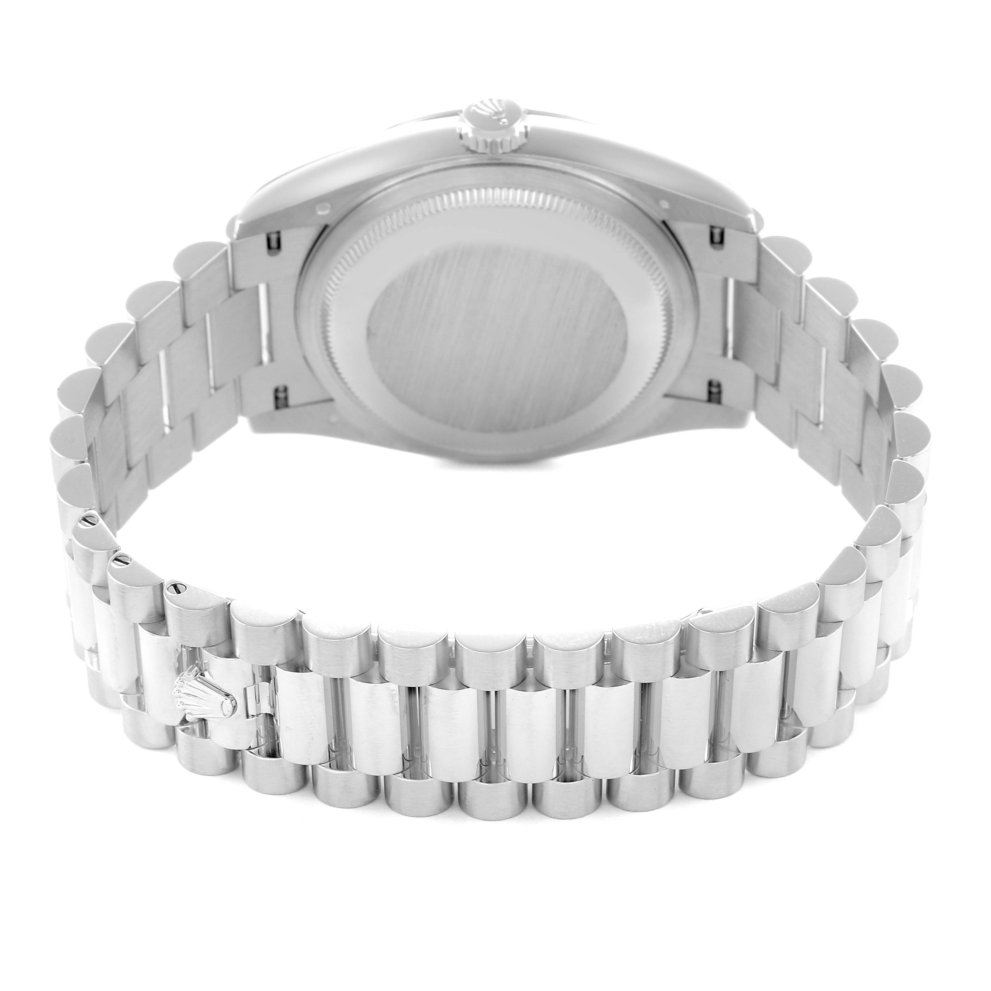 The Rolex President 128236 Men
s Platinum Blue Dial model is shown from the back, displaying the case back and bracelet with the clasp visible.