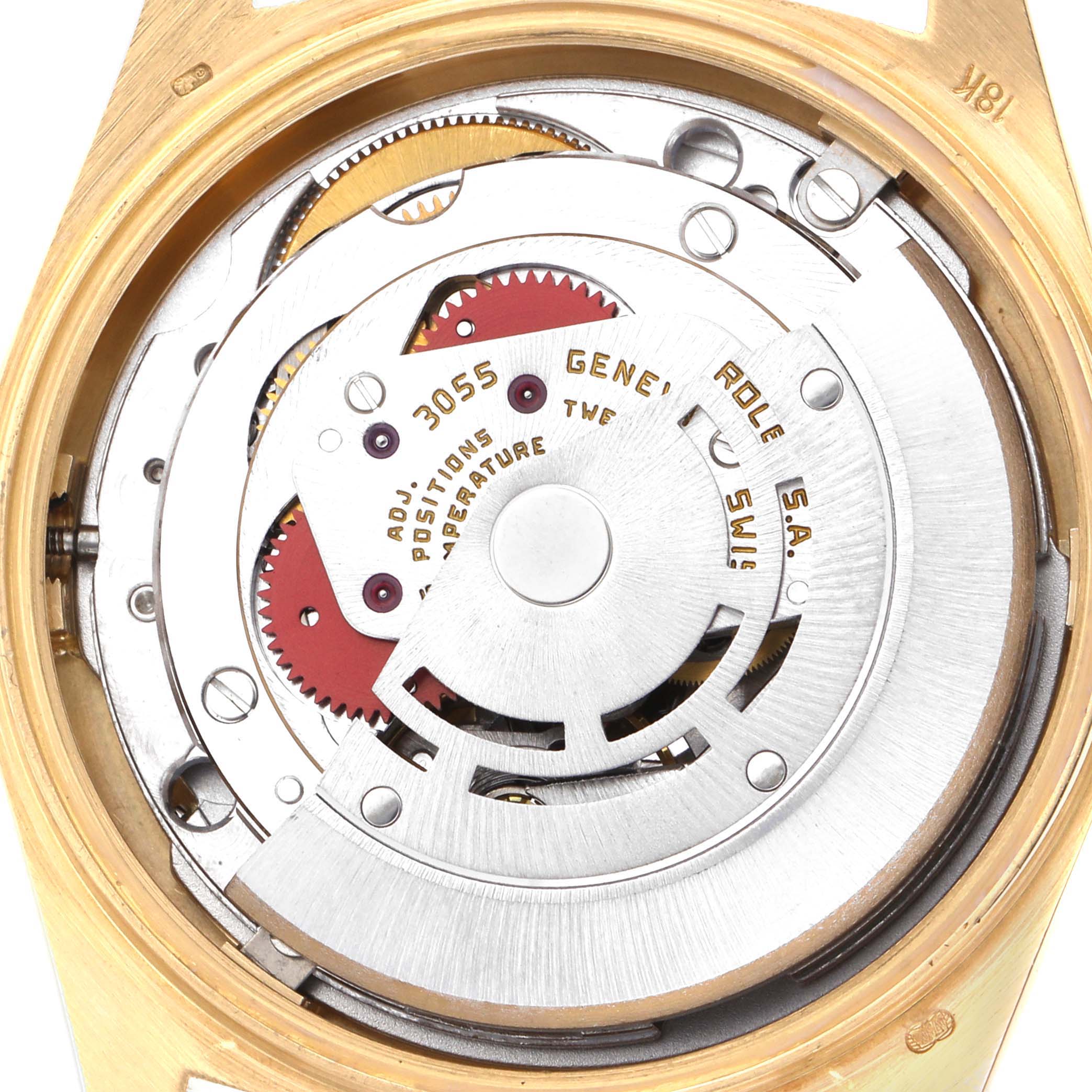 The image shows the movement of a Rolex President 18038 Men
s Yellow Gold Champagne Dial model, highlighting its inner mechanism from a back view.