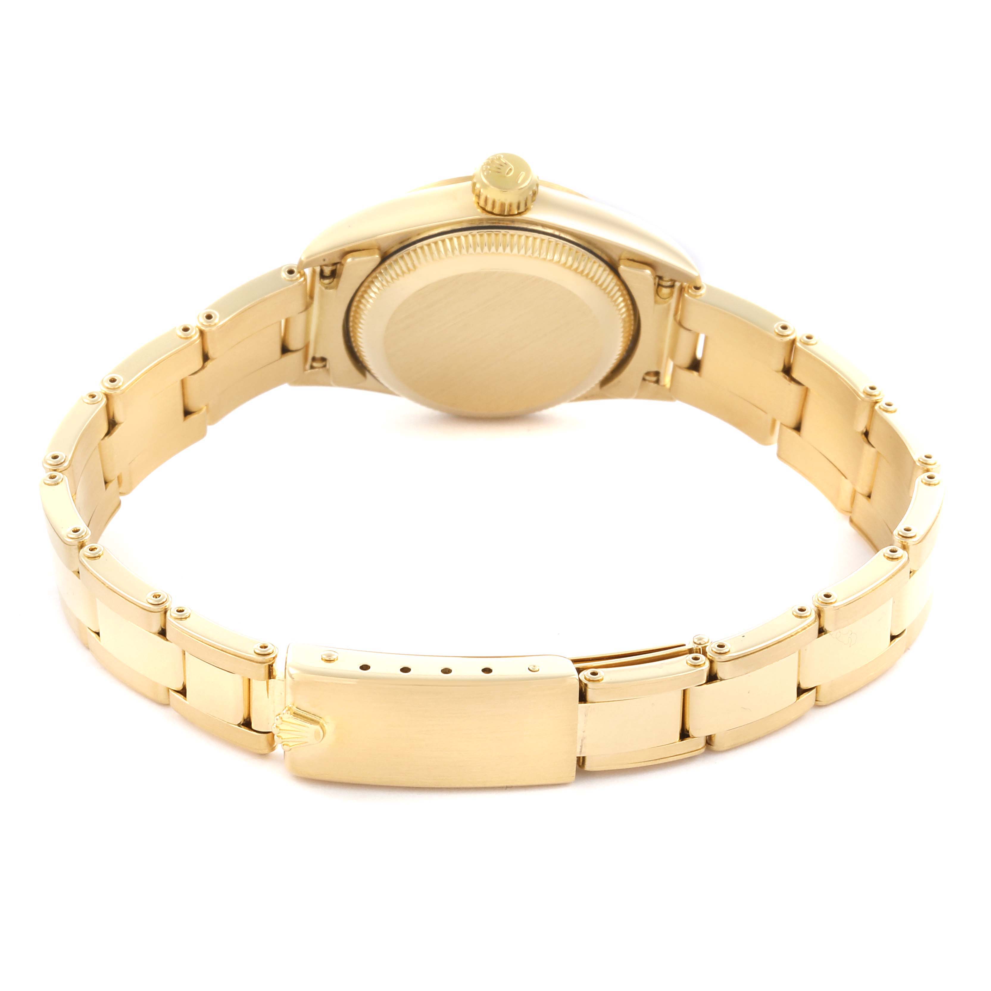 The image shows the back of the Rolex President 67198 Women's Yellow Gold Champagne Dial 67198 Women's Yellow Gold Champagne Dial watch, highlighting its bracelet and clasp.