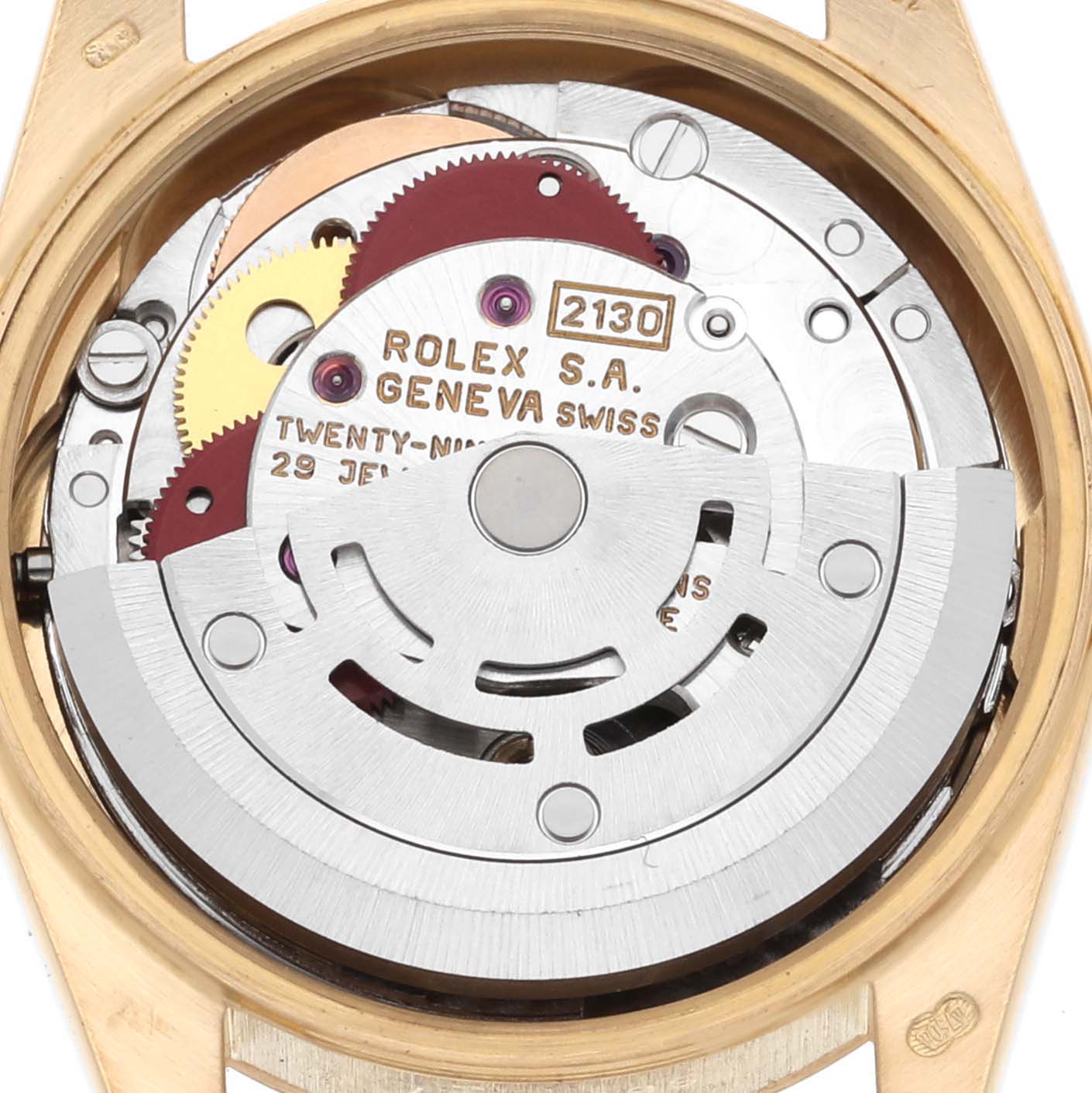 This image shows the movement of a Rolex President 67198 Women's Yellow Gold Champagne Dial 67198 Women's Yellow Gold Champagne Dial watch viewed from the back, displaying gears and the rotor.
