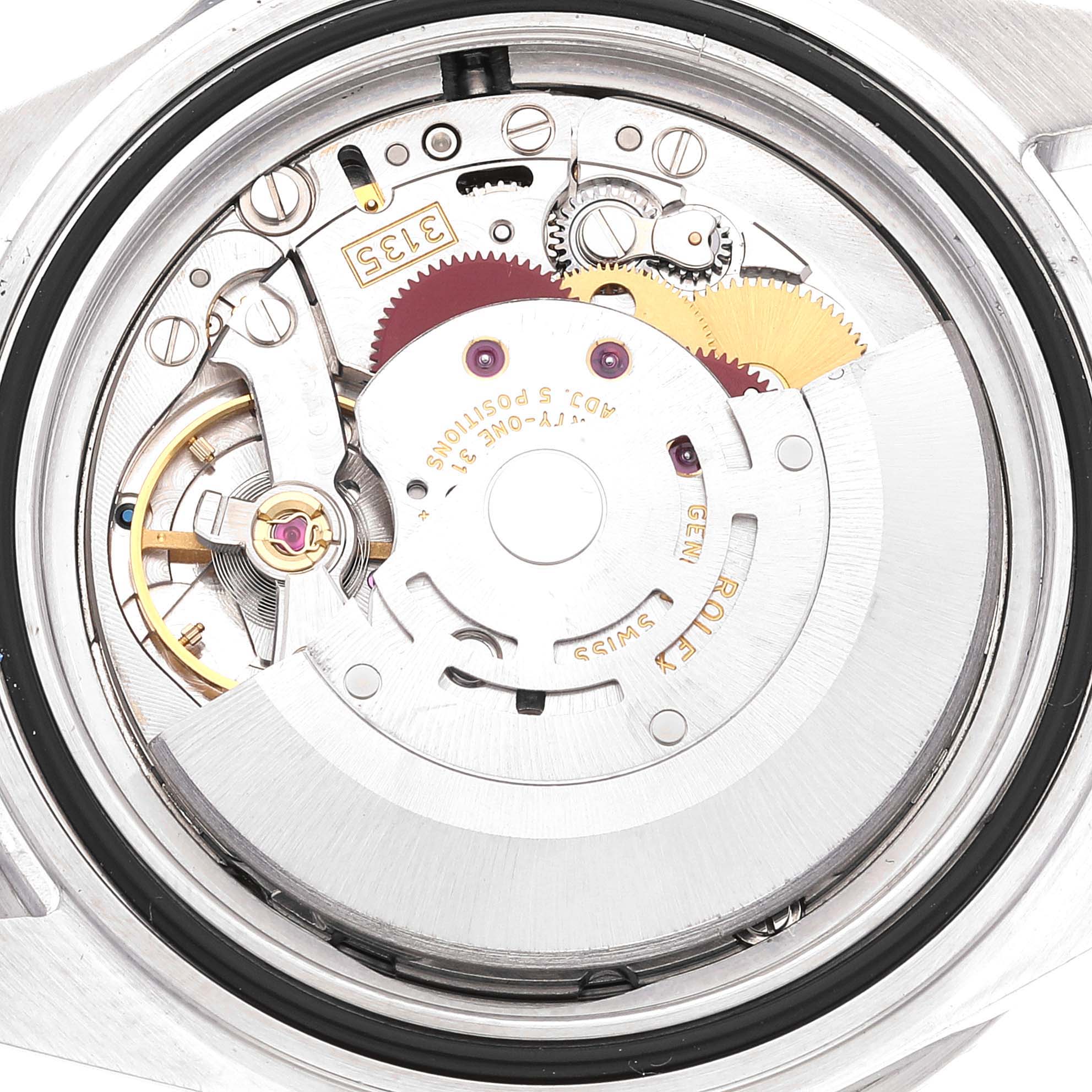 This image shows the back of a Rolex Submariner 16610LV Men's Stainless Steel Black Dial 16610LV Men's Stainless Steel Black Dial watch, focusing on its intricate internal mechanical movement.