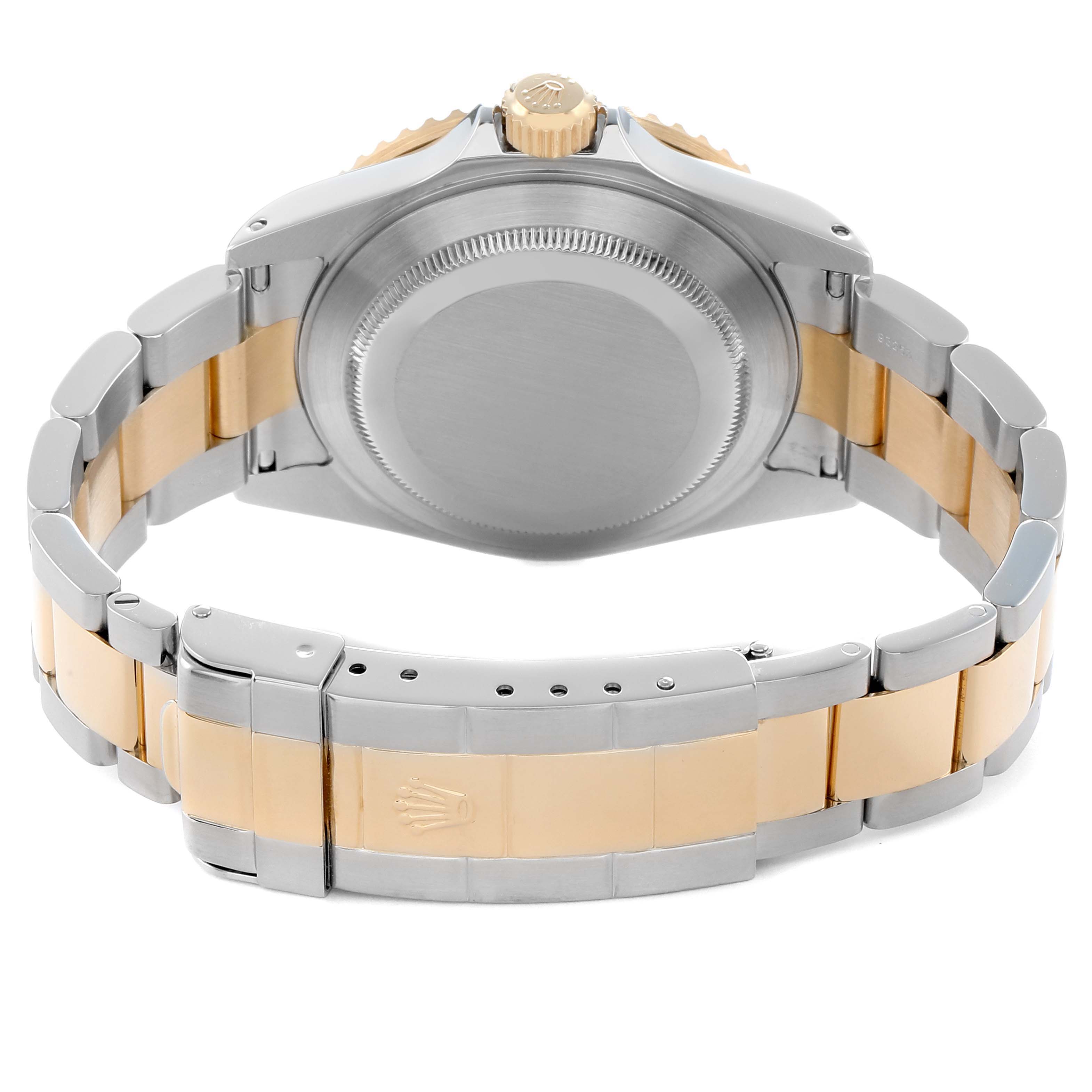 The image shows the back case and bracelet of a Rolex Submariner 16613 Men
s Steel and Gold (two tone) Black Dial, highlighting the clasp and links.