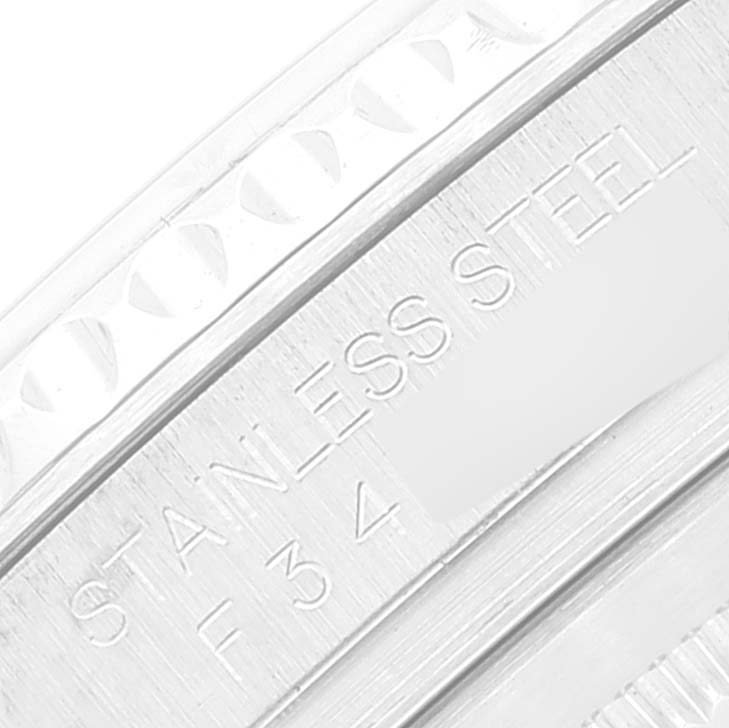 This close-up image shows the "STAINLESS STEEL" engraving on the case back of a Rolex Yacht-Master 16622 Men's Stainless Steel Silver Dial 16622 Men's Stainless Steel Silver Dial watch.
