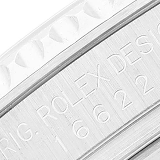The image shows a close-up of the case side of a Rolex Yacht-Master 16622 Men's Stainless Steel Silver Dial 16622 Men's Stainless Steel Silver Dial, focusing on its engraved model number and design details.