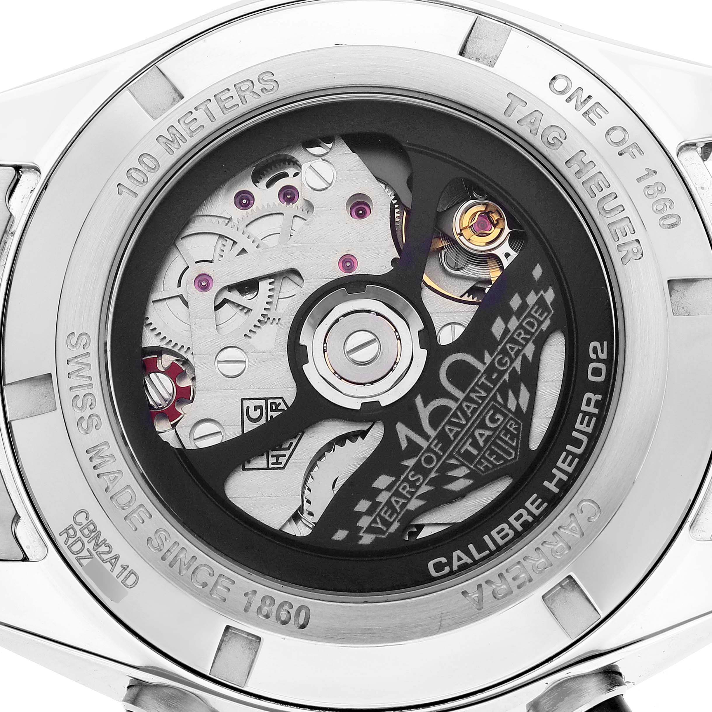 This image shows the back of the Tag Heuer Limited Edition CBN2A1D.BA0643 Men's Stainless Steel Silver Dial CBN2A1D.BA0643 Men's Stainless Steel Silver Dial watch, revealing the intricate mechanics and engravings.