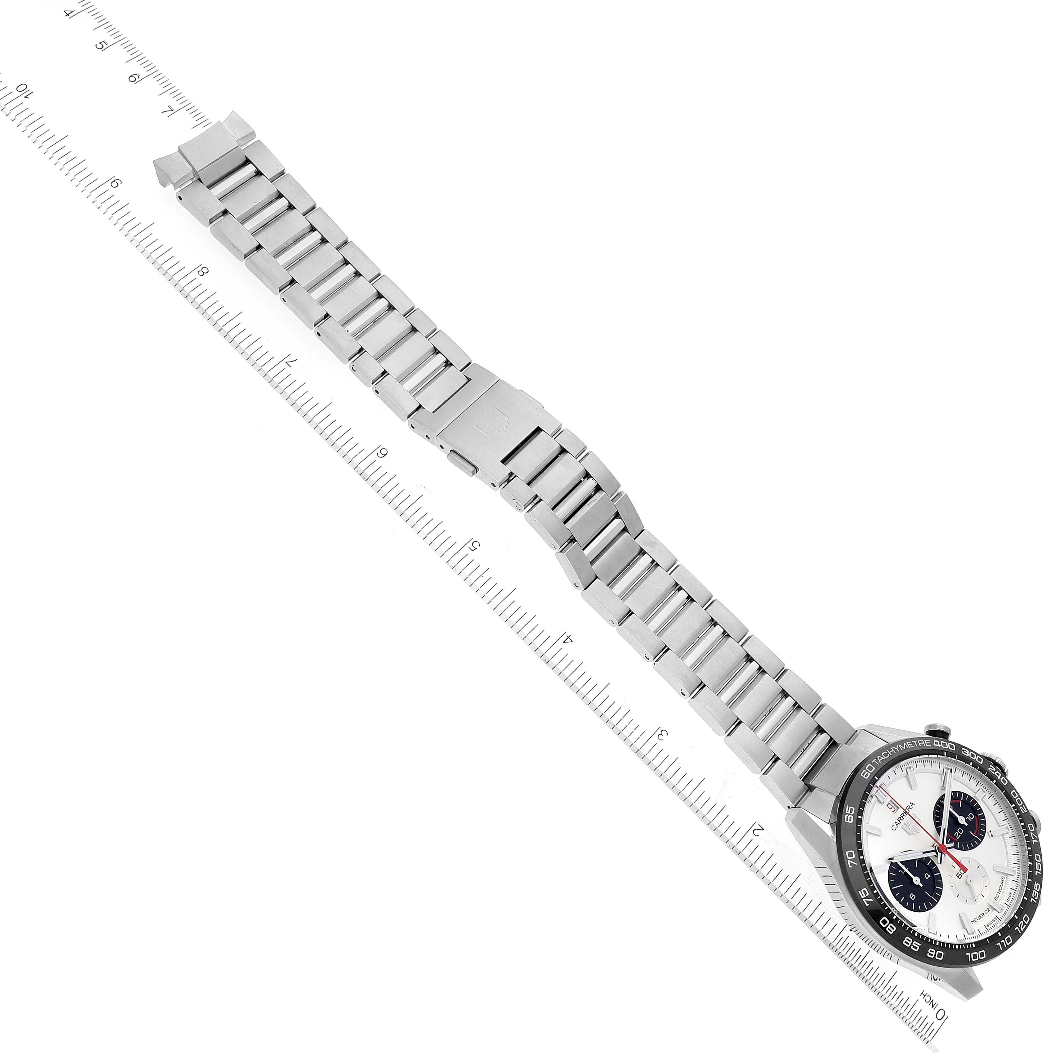 This image shows the full length, face, and metal bracelet of a Tag Heuer Limited Edition CBN2A1D.BA0643 Men's Stainless Steel Silver Dial CBN2A1D.BA0643 Men's Stainless Steel Silver Dial watch, placed alongside a ruler.