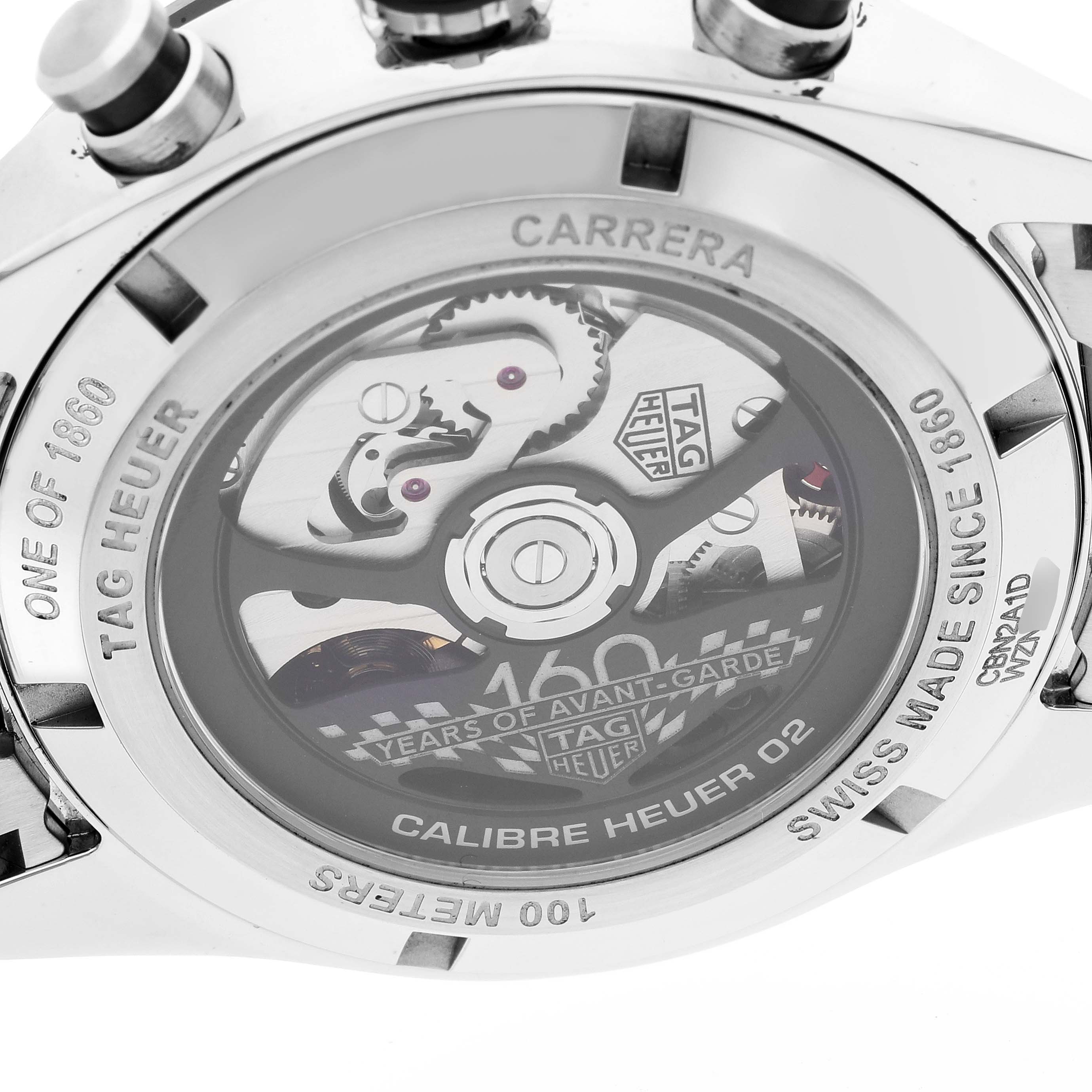 The image shows the back side of the Tag Heuer Carrera Limited Edition watch, revealing the movement and inscriptions.