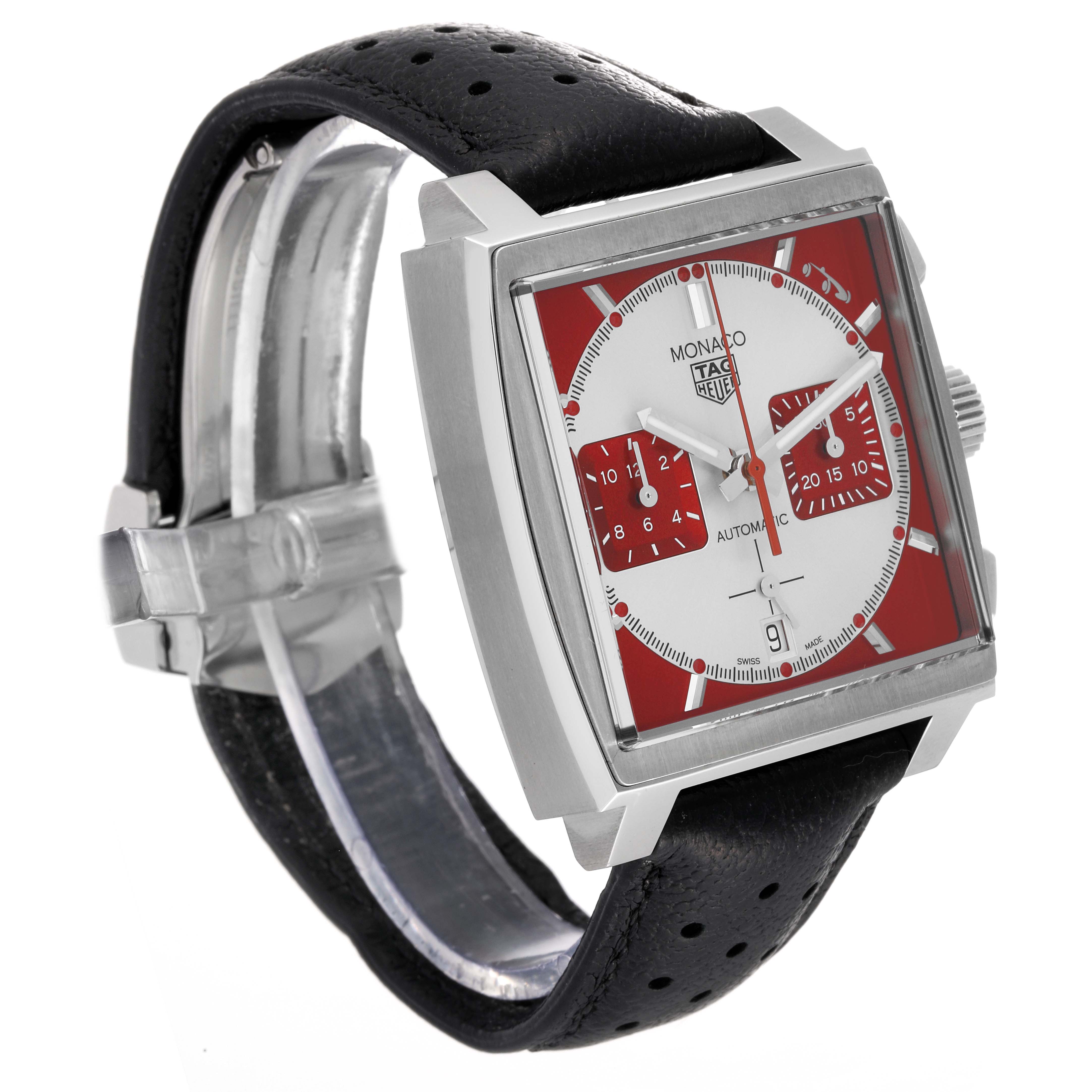 This image shows a Tag Heuer Monaco CBL2114.FC6486 Men's Stainless Steel Red Dial CBL2114.FC6486 Men's Stainless Steel Red Dial watch at a three-quarter angle, highlighting its red and white dial, square case, and black perforated strap.