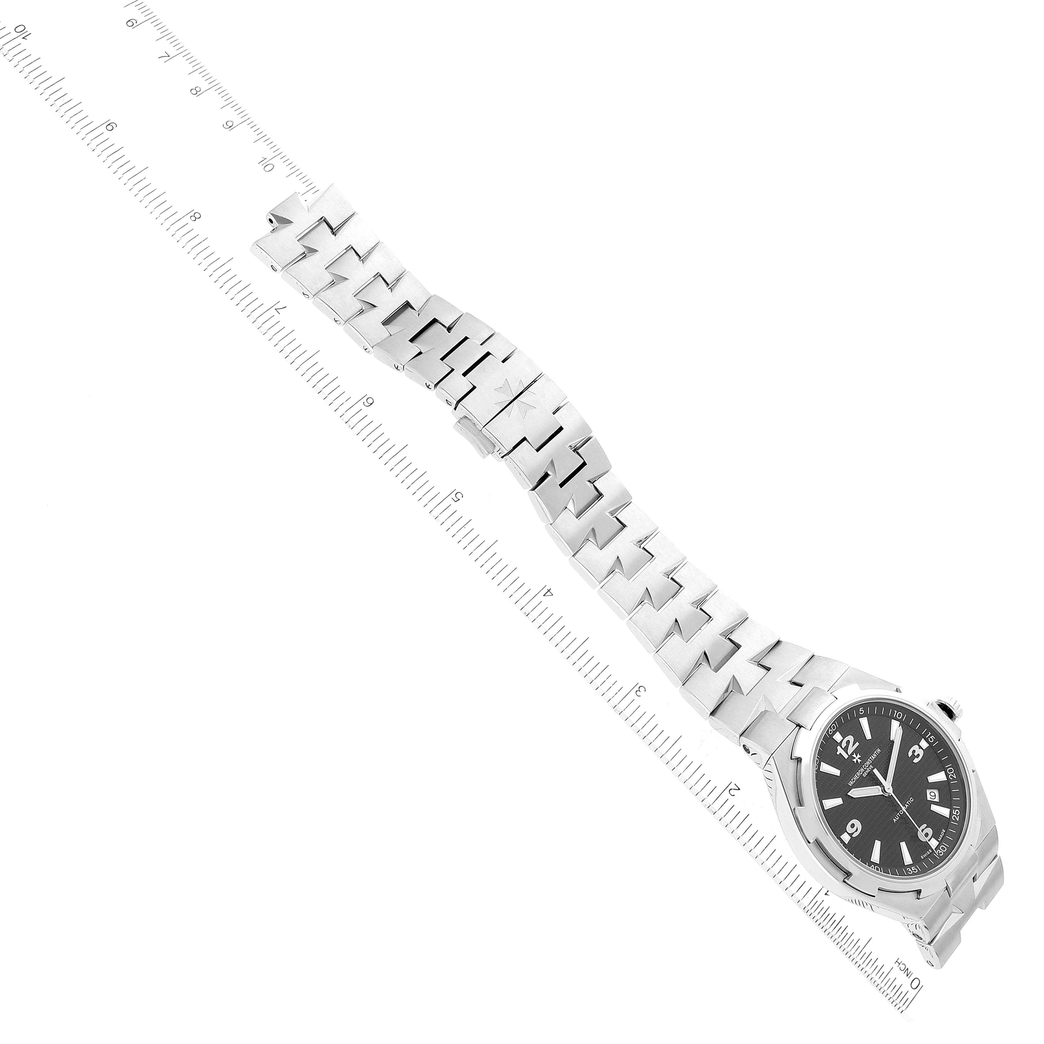 This image displays an angled view of a Vacheron Constantin Overseas 47040/B01A-9094 Men's Stainless Steel Black Dial 47040/B01A-9094 Men's Stainless Steel Black Dial watch, showing its face and stainless steel bracelet.