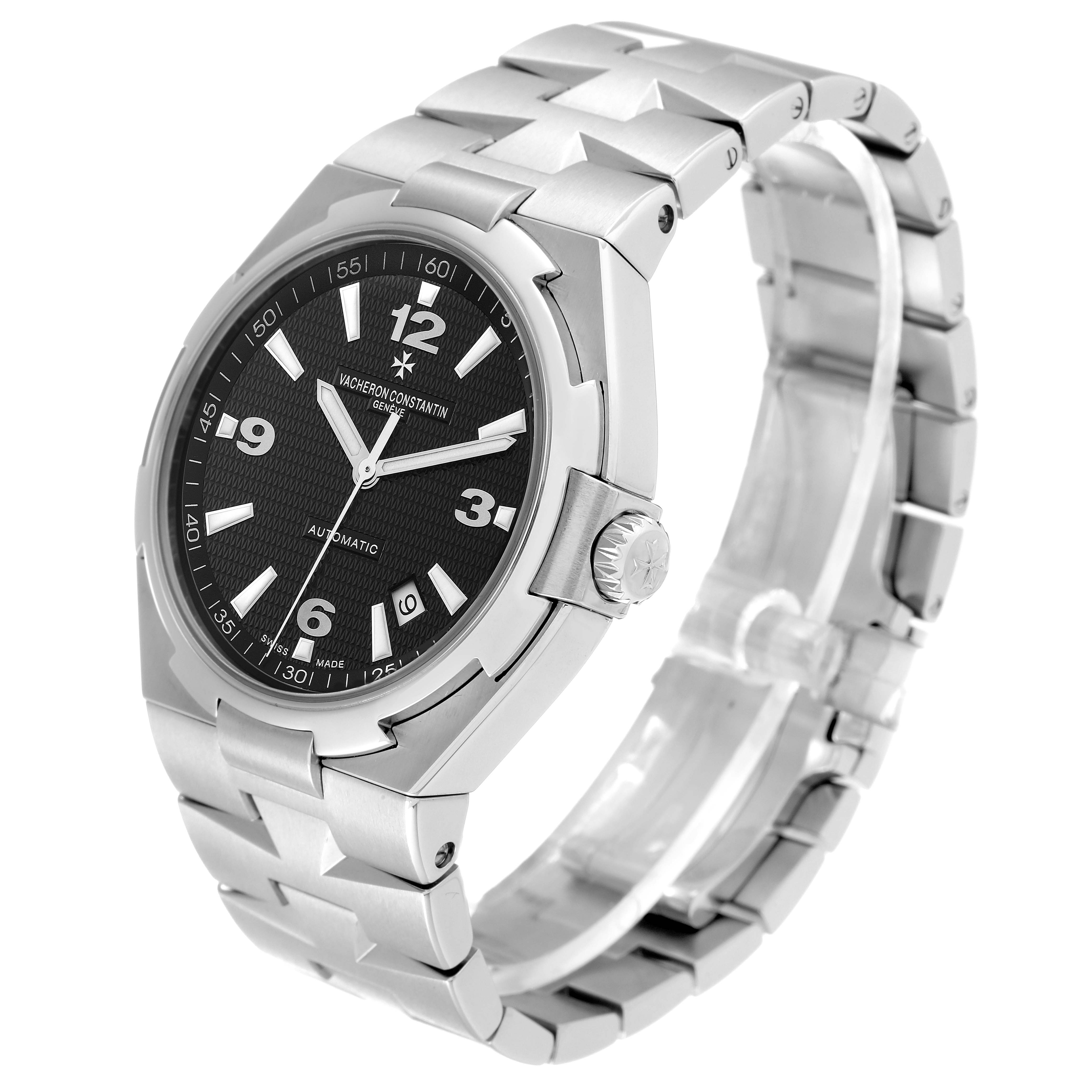 The image shows a side angle of a Vacheron Constantin Overseas 47040/B01A-9094 Men's Stainless Steel Black Dial 47040/B01A-9094 Men's Stainless Steel Black Dial watch, highlighting the dial, bezel, crown, and bracelet.