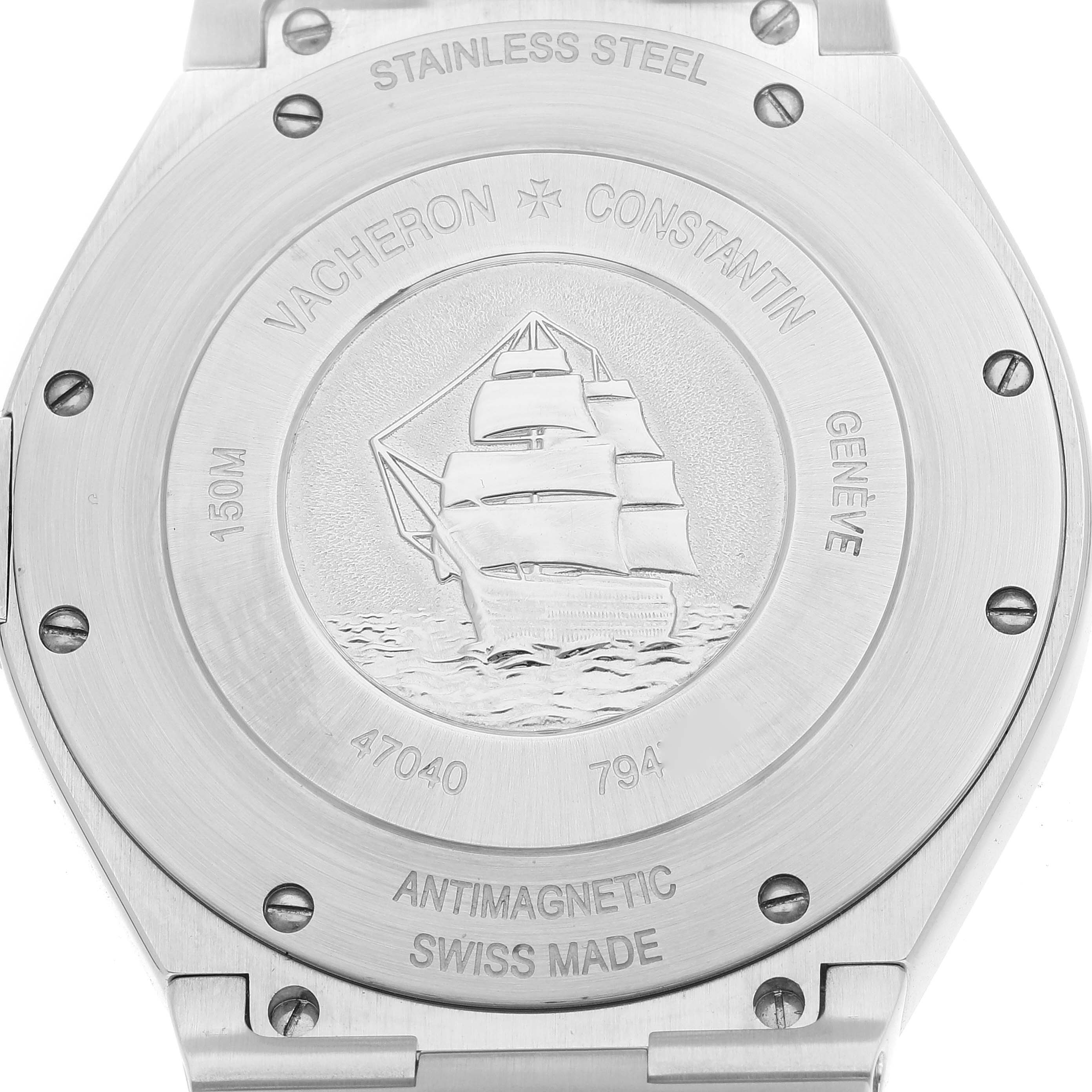 This image shows the stainless steel case back of the Vacheron Constantin Overseas 47040/B01A-9094 Men's Stainless Steel Black Dial 47040/B01A-9094 Men's Stainless Steel Black Dial watch, featuring an engraved ship motif.