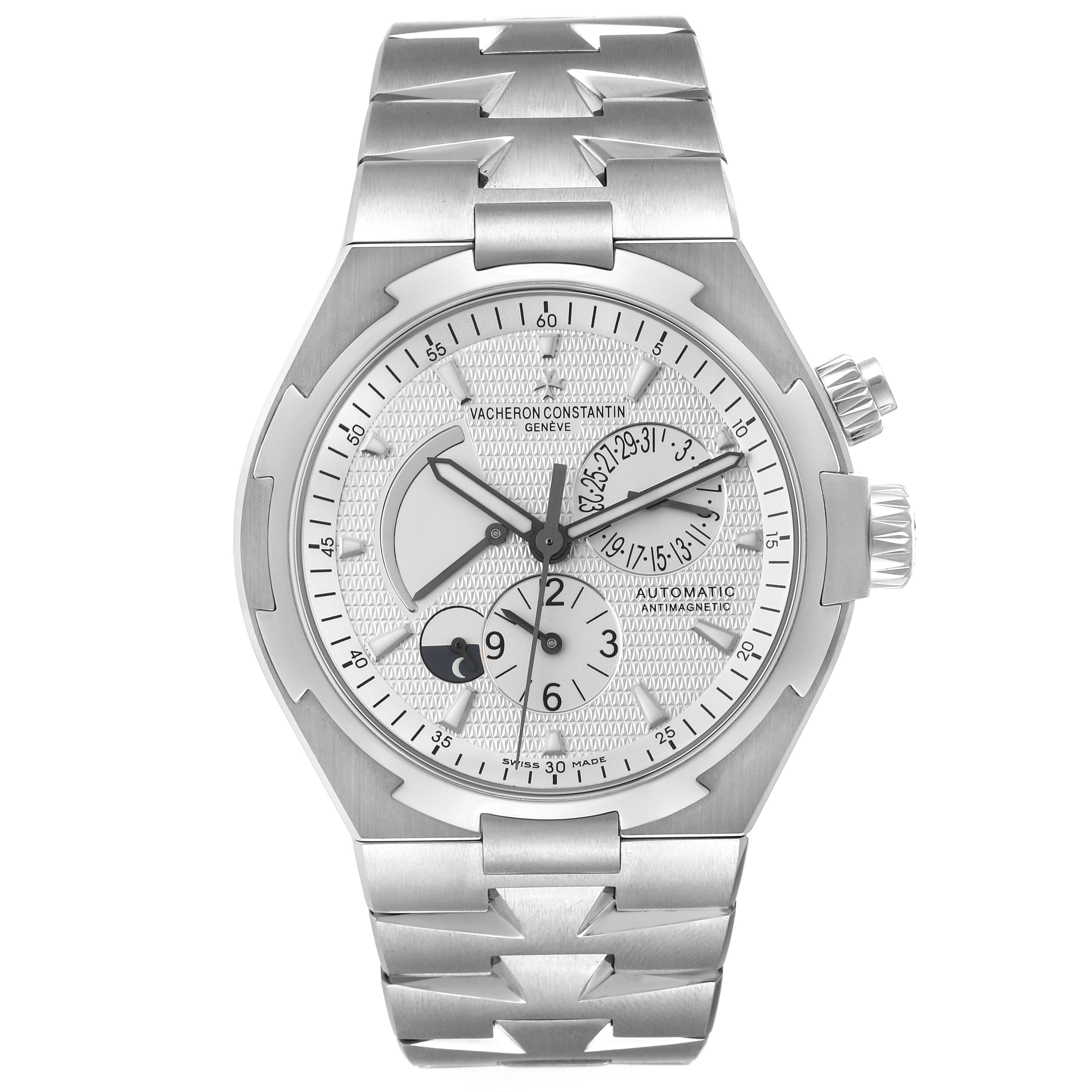 The image shows a front view of the Vacheron Constantin Overseas 47450/B01A-9226 Men
s Stainless Steel Silver Dial 47450/B01A-9226 Men
s Stainless Steel Silver Dial watch, showcasing its dial, hands, and stainless steel bracelet.