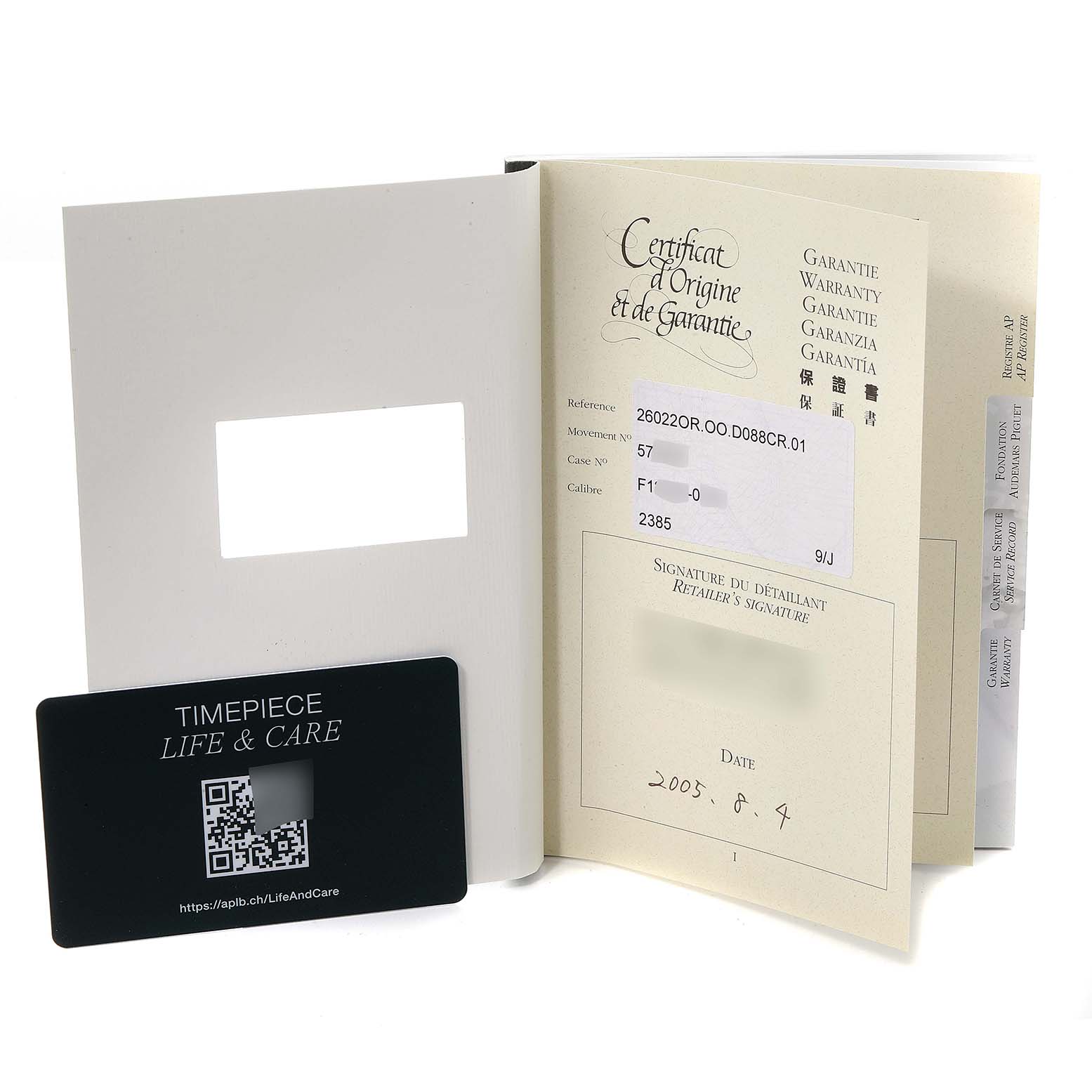 The image shows the certificate of origin and guarantee booklet and a warranty card for the Audemars Piguet Royal Oak 26022OR.OO.D088CR.01 Men's Rose Gold Silver Dial 26022OR.OO.D088CR.01 Men's Rose Gold Silver Dial watch model.