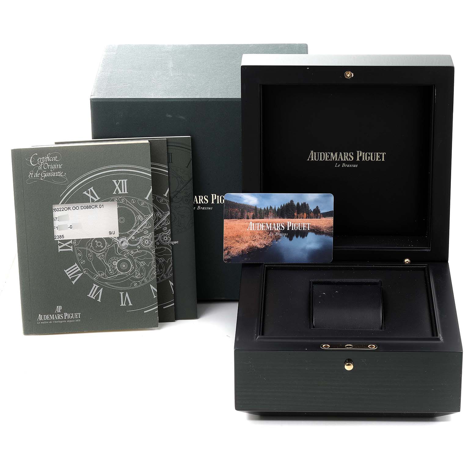 The image shows the packaging, certificate, and box of an Audemars Piguet Royal Oak 26022OR.OO.D088CR.01 Men's Rose Gold Silver Dial 26022OR.OO.D088CR.01 Men's Rose Gold Silver Dial watch.