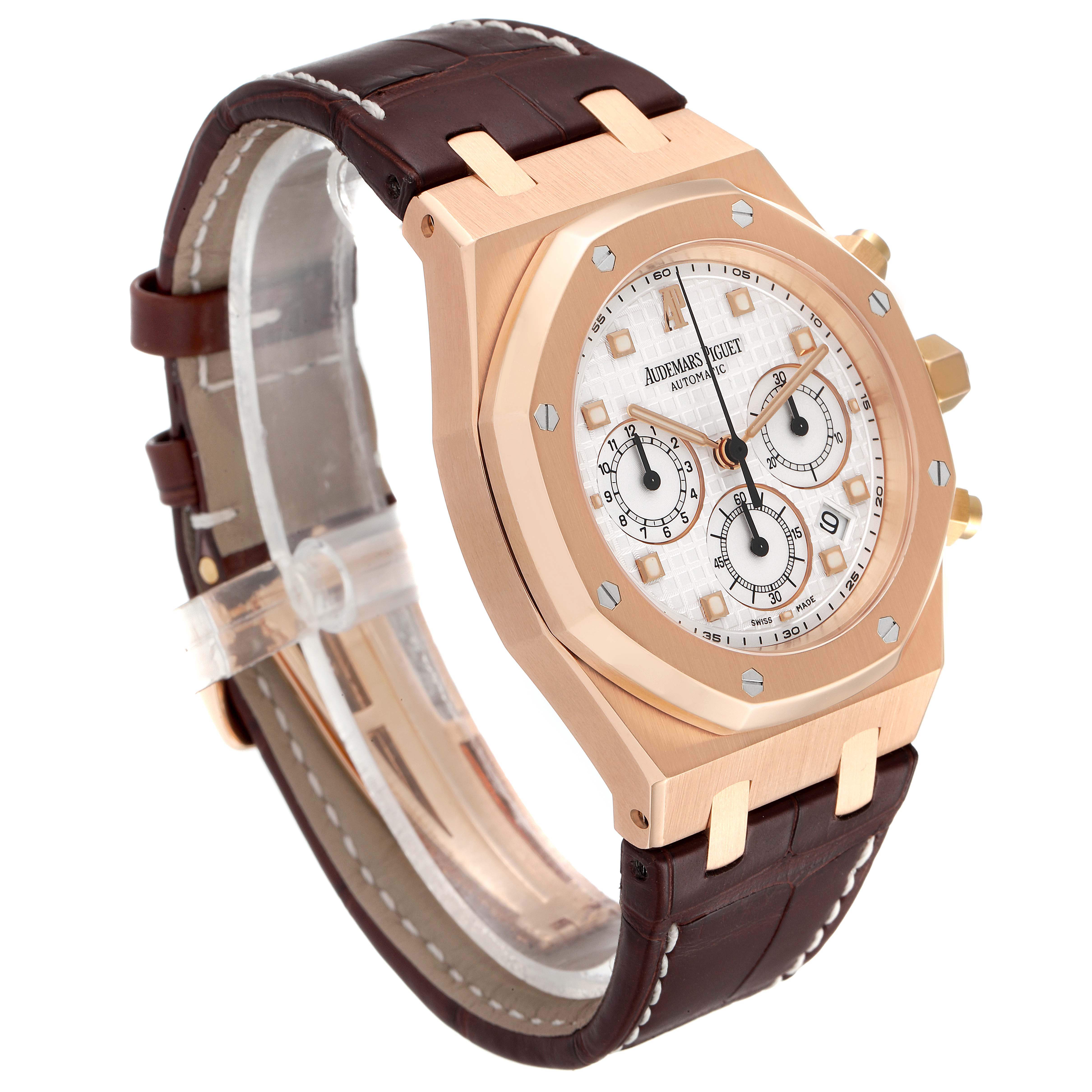 This image shows the Audemars Piguet Royal Oak 26022OR.OO.D088CR.01 Men's Rose Gold Silver Dial 26022OR.OO.D088CR.01 Men's Rose Gold Silver Dial watch at a three-quarter angle, highlighting its rose gold case and brown leather strap.