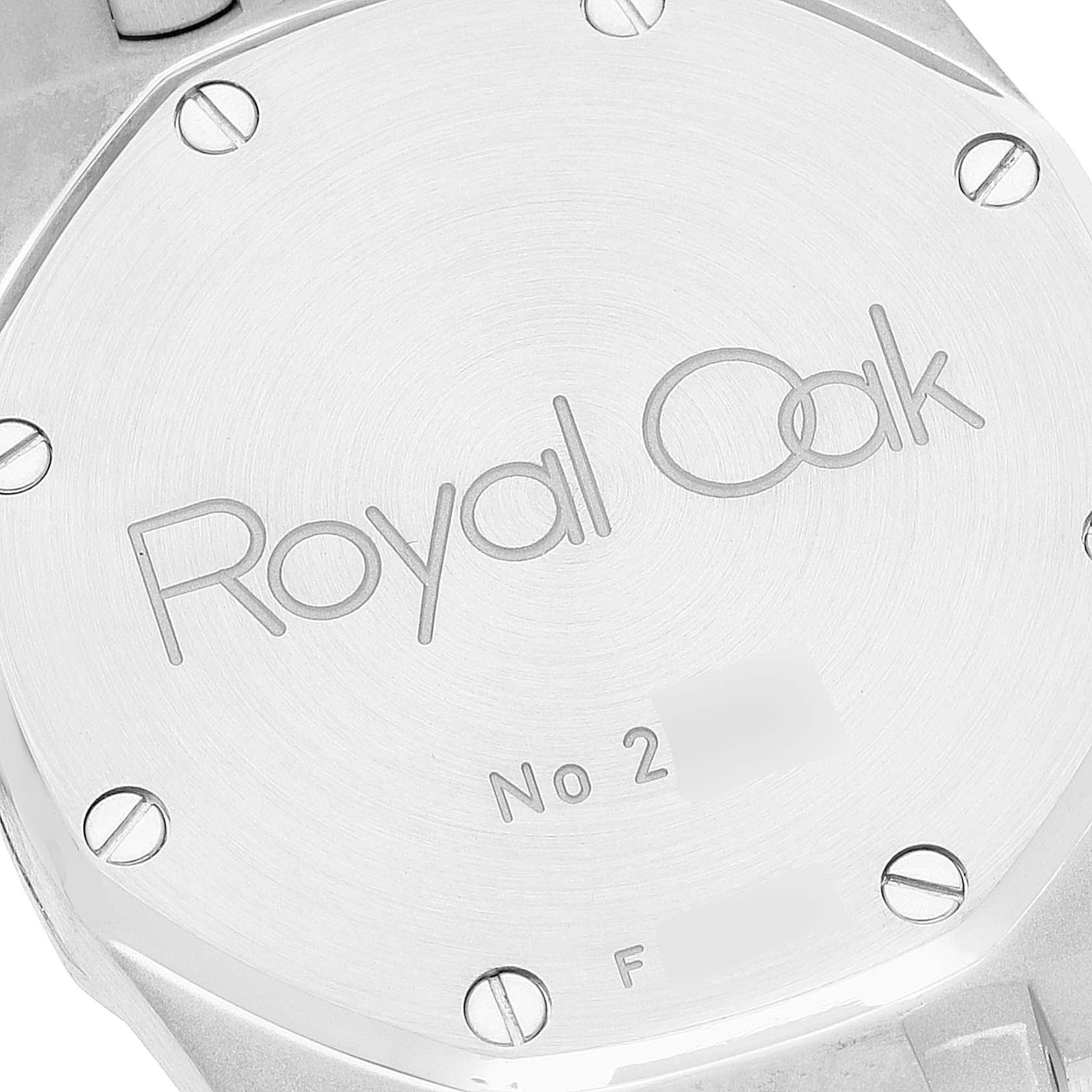 The image shows the back case of the Audemars Piguet Royal Oak 15000ST. Men's Stainless Steel Silver Dial 15000ST. Men's Stainless Steel Silver Dial watch, displaying its engraved model name and screws.