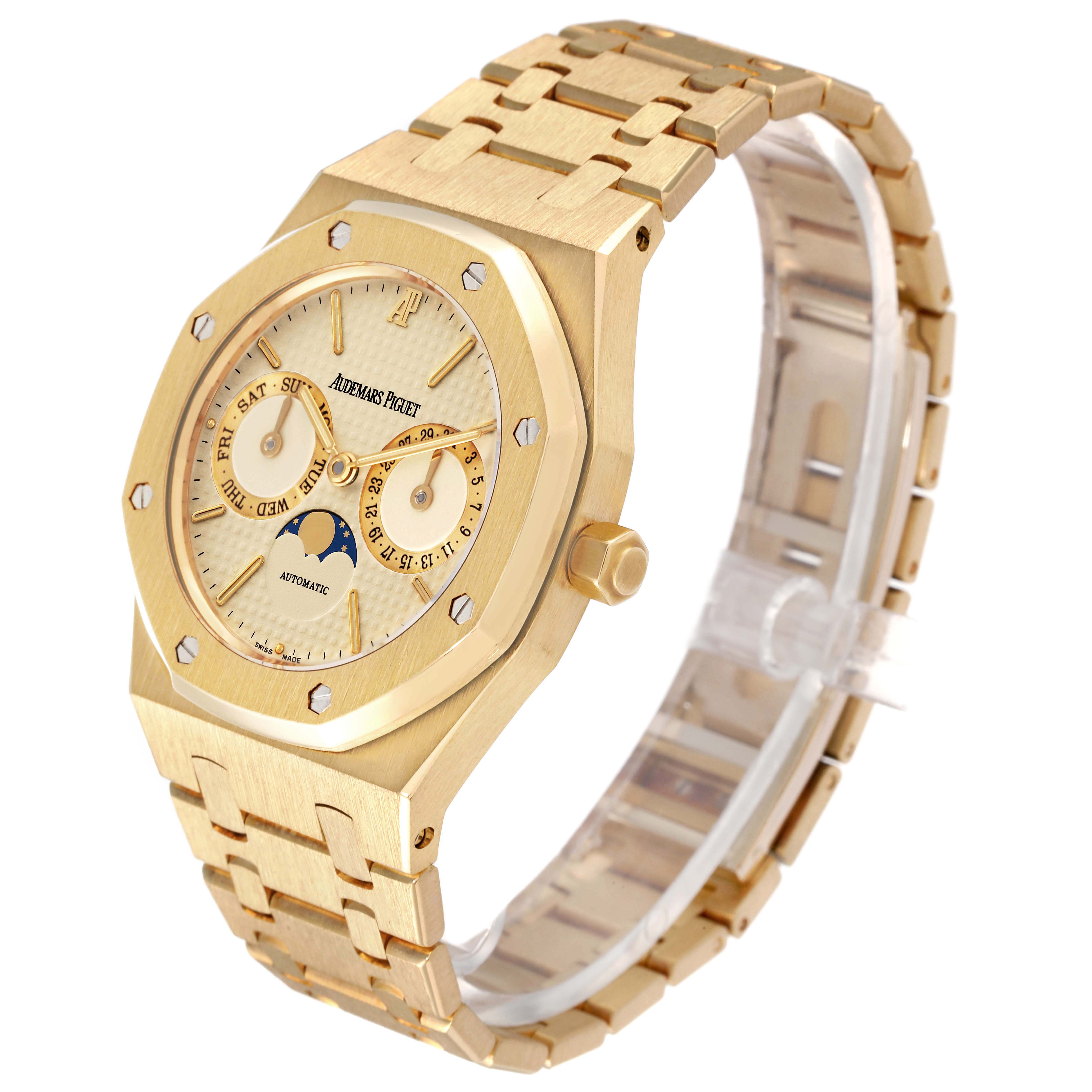 This image shows a side angle of the Audemars Piguet Royal Oak 25594BA.OO.0477BA.01 Men's Yellow Gold Champagne Dial 25594BA.OO.0477BA.01 Men's Yellow Gold Champagne Dial watch highlighting the gold case, dial, and bracelet.