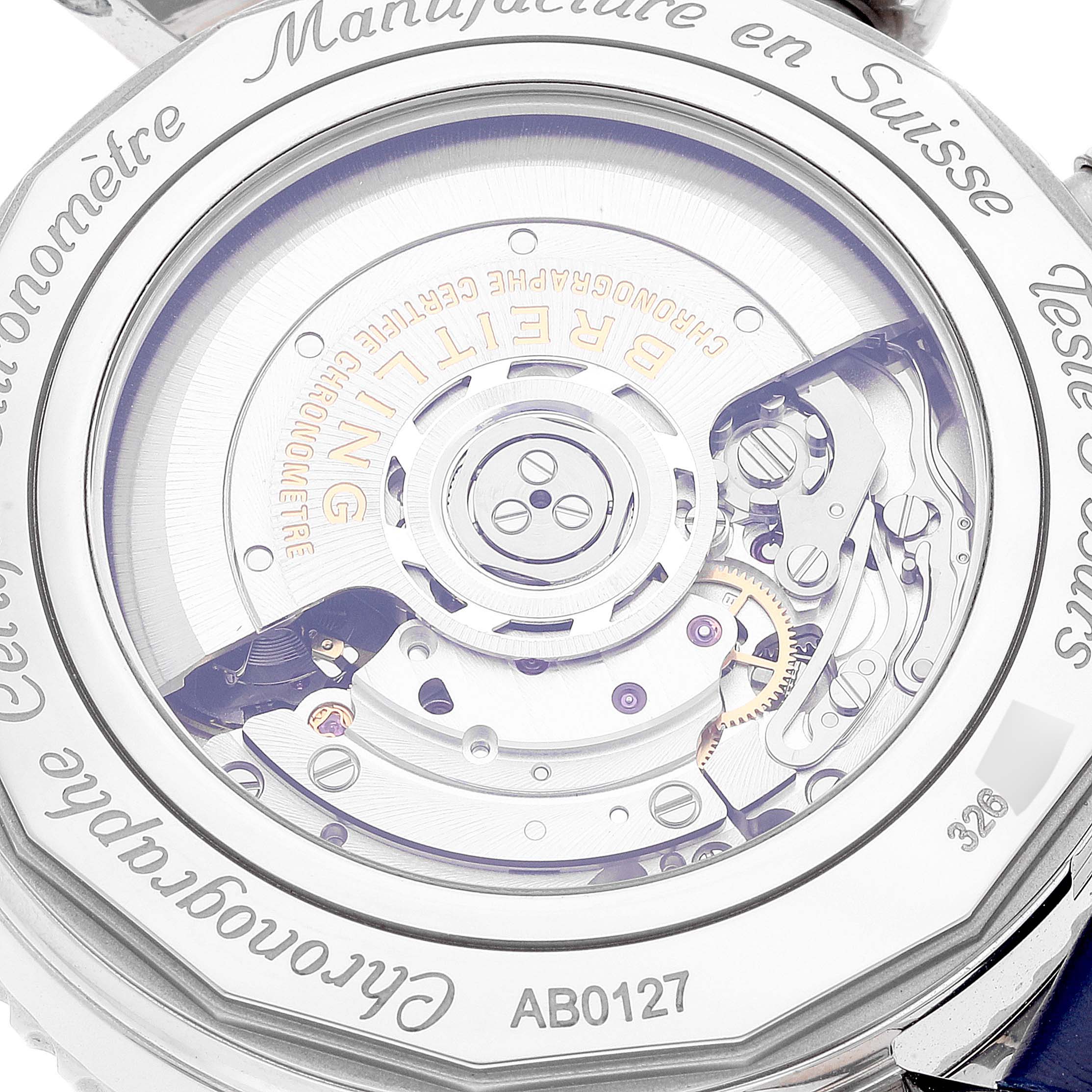 The image shows the back view of the Breitling Navitimer AB0127 Men's Stainless Steel Blue Dial AB0127 Men's Stainless Steel Blue Dial watch, focusing on its intricate movement and engraved details.