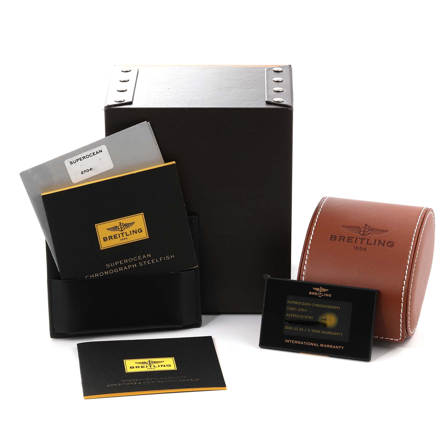 The image shows Breitling Superocean A13341 Men's Stainless Steel White Dial A13341 Men's Stainless Steel White Dial watch accessories, including a box, manuals, and an international warranty card.