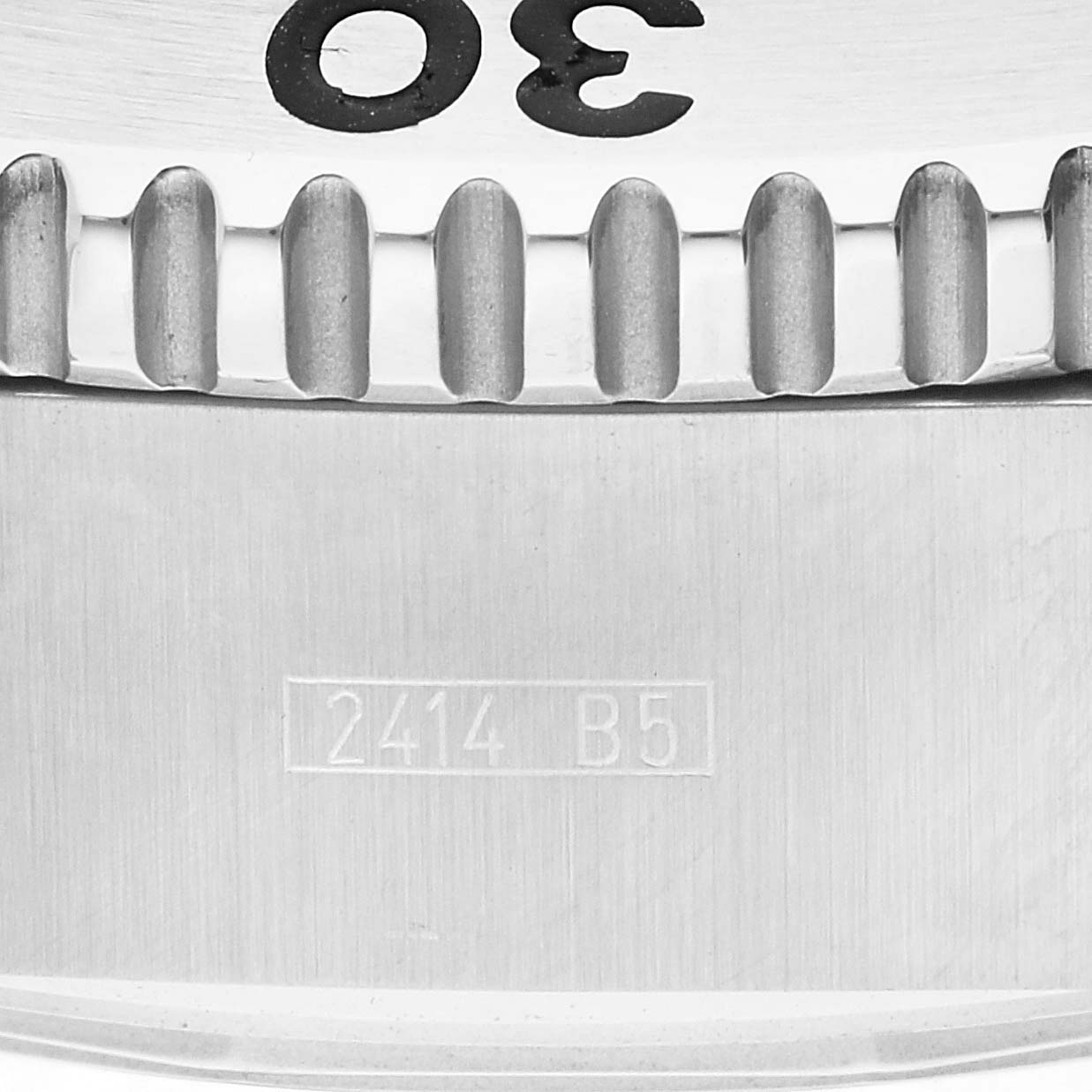 The close-up image shows part of the bezel and engraved serial number of a Breitling Superocean A13341 Men's Stainless Steel White Dial A13341 Men's Stainless Steel White Dial watch.