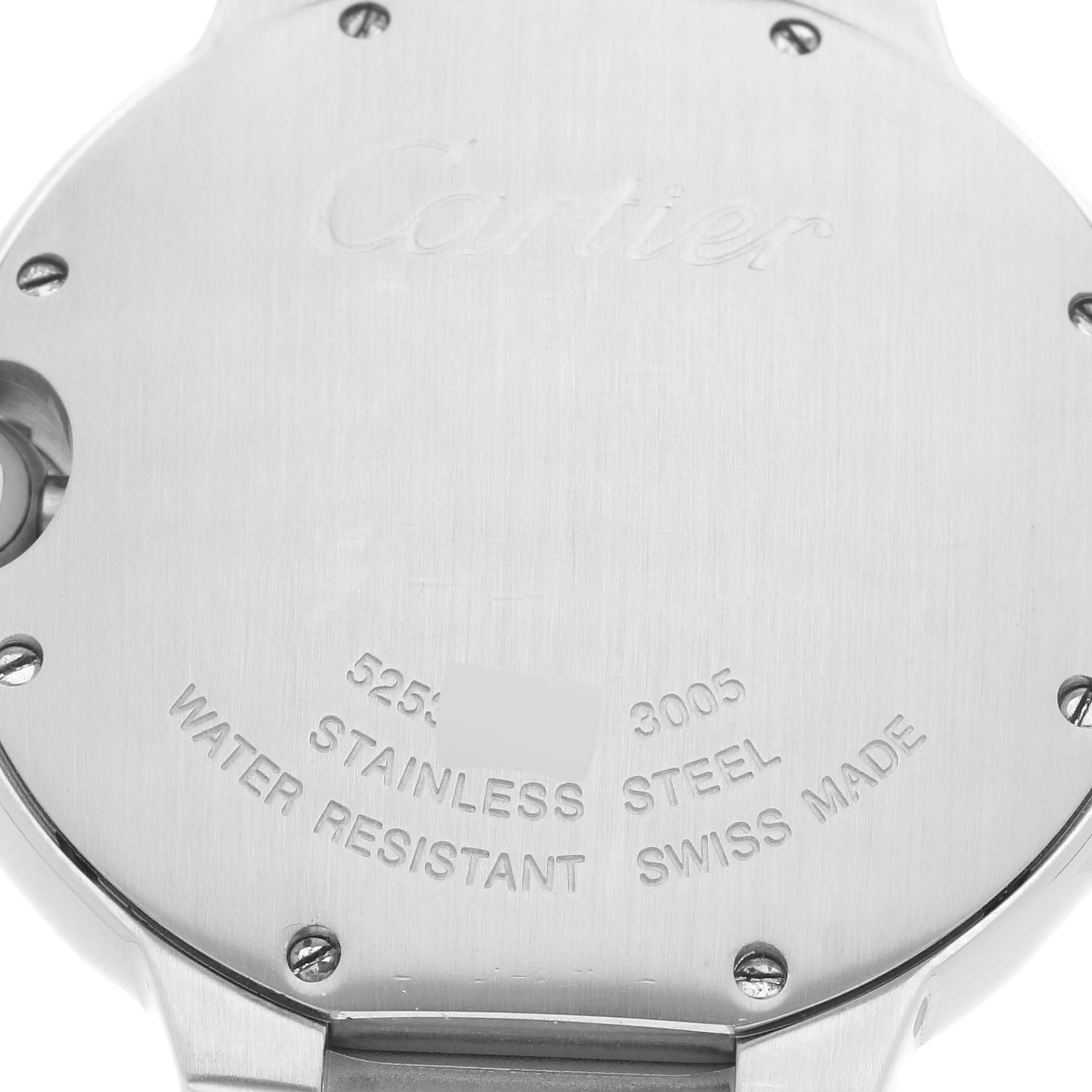 The image shows the back case of a Ballon Bleu model by Cartier, highlighting its stainless steel composition and water resistance.