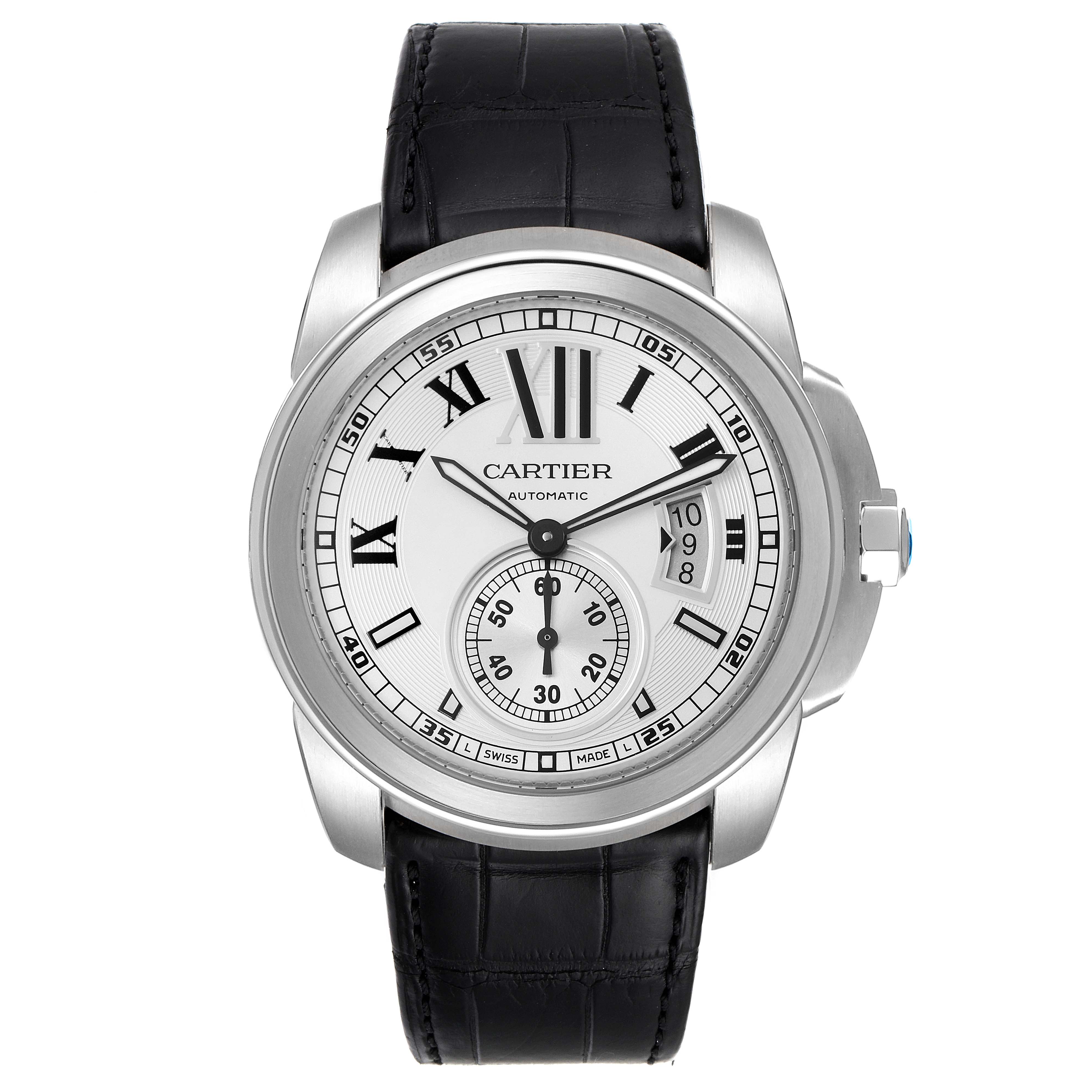 The image shows a front view of the Calibre de Cartier watch by Cartier, featuring a silver dial, Roman numerals, and a black leather strap.